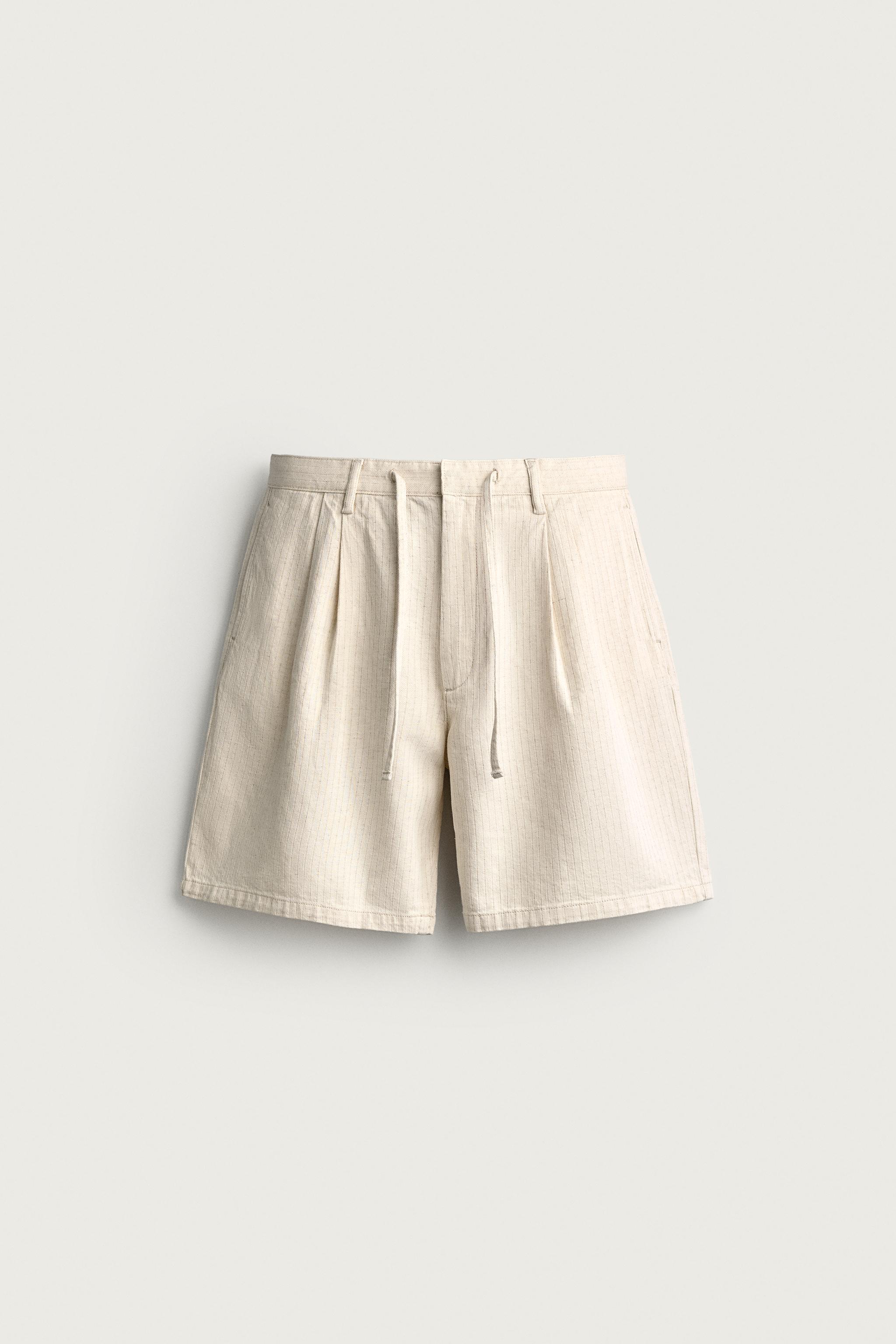 WIDE FIT STRIPED PLEATED SHORTS — Ecru