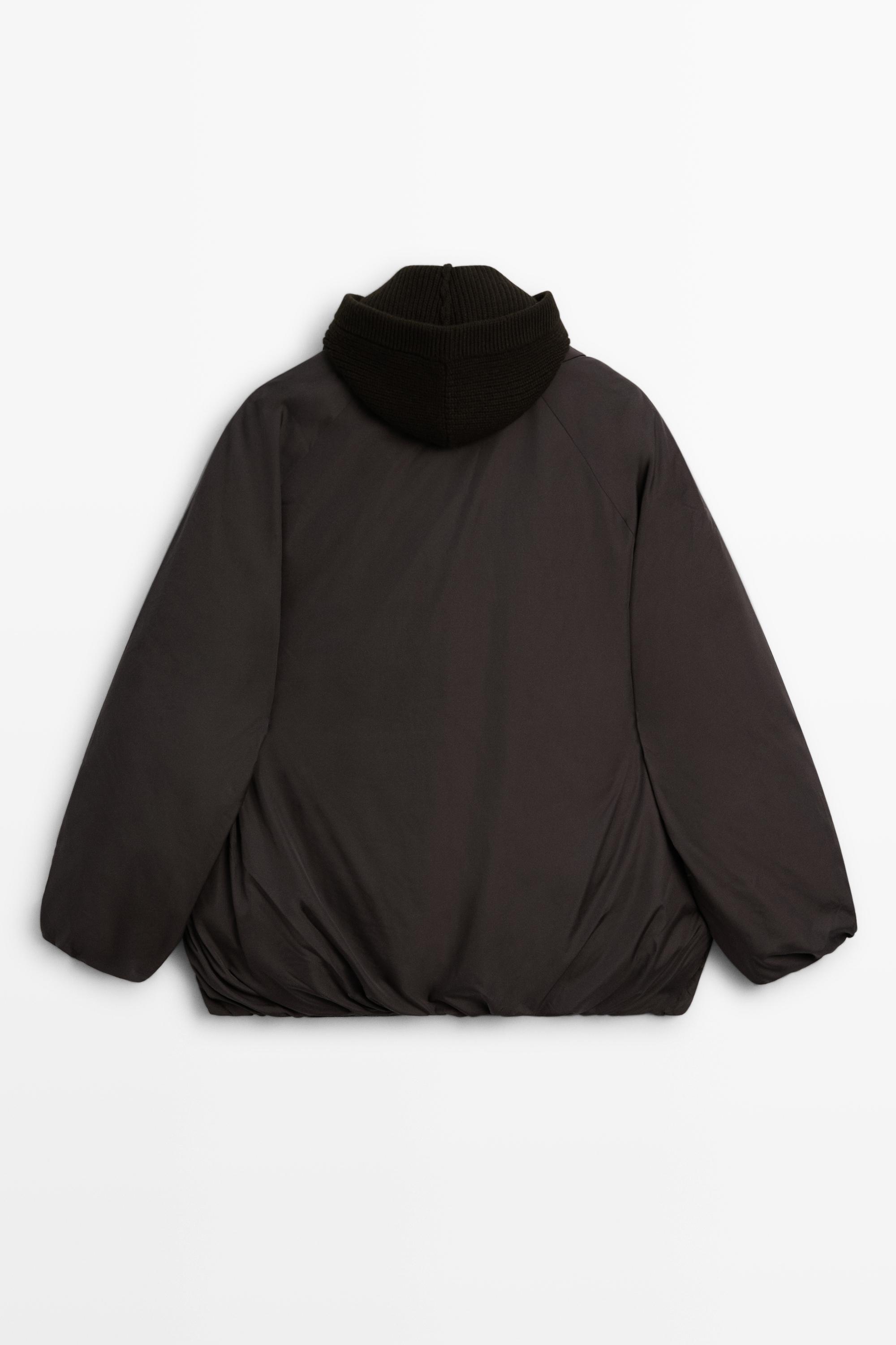 Down jacket with detachable detail piece