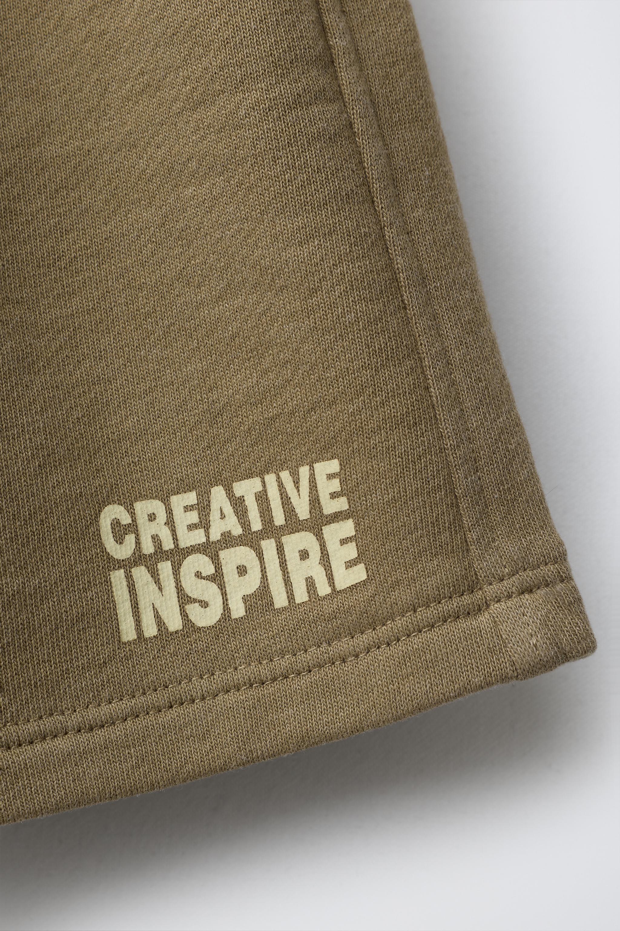 PLUSH TEXT SHORTS