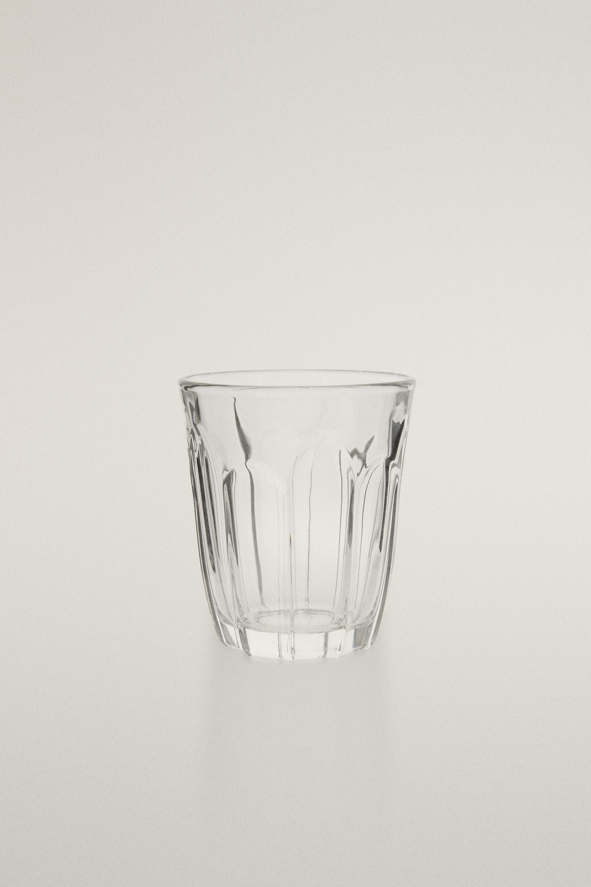 COFFEE TUMBLER WITH RAISED DESIGN — Transparent