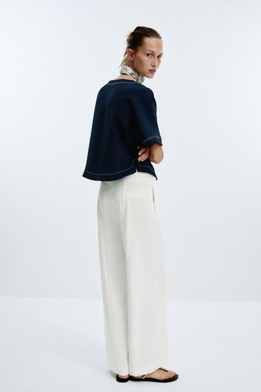 PANTALON PASSANTS SURPIQÛRES CONTRASTE - Blanc cassé de Zara - Image 2