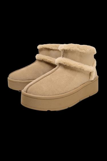 FLACHE STIEFELETTE MIT FELL-EFFEKT - Braun von Zara