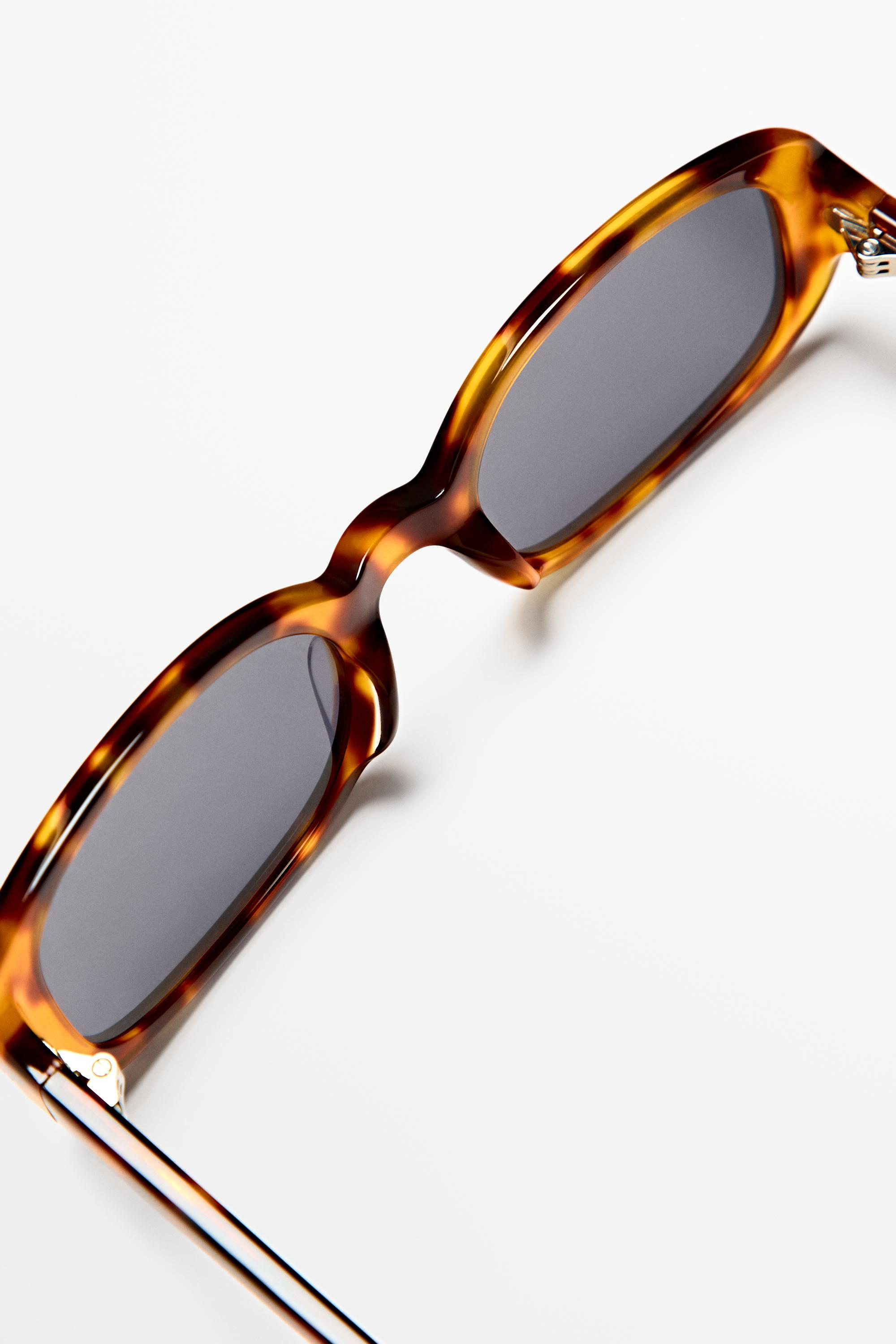 Lunettes de soleil ovales effet écaille