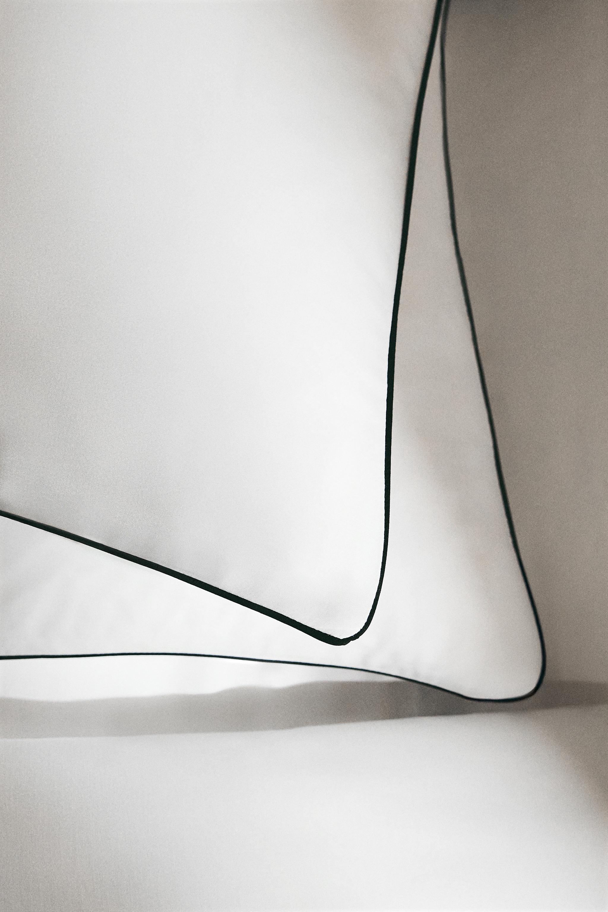 TAIE D’OREILLER SATIN PASSEPOIL