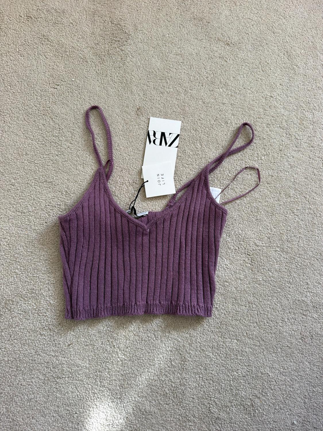 Purple ribbed knit crop top with thin straps on a carpet. Includes labels with the text ZARA and JOIN LIFE.