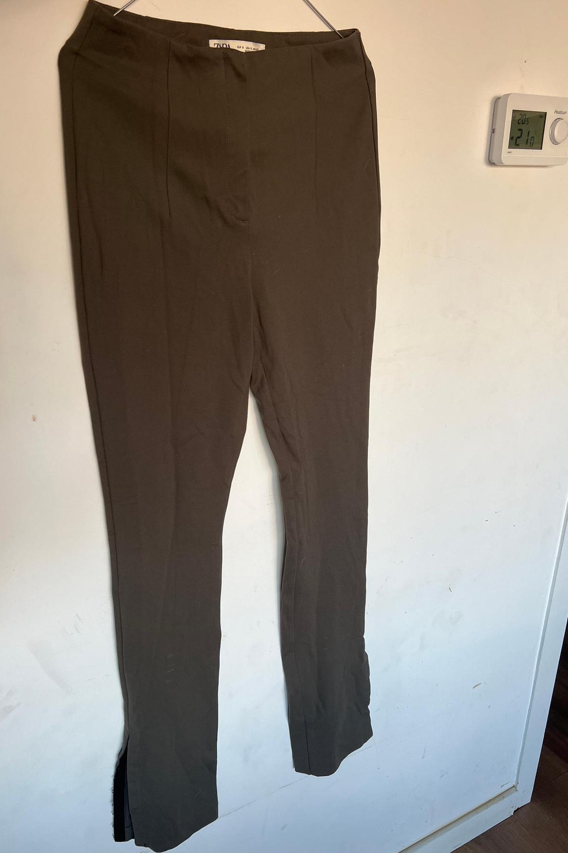 TROUSERS WITH SPLIT HEMS