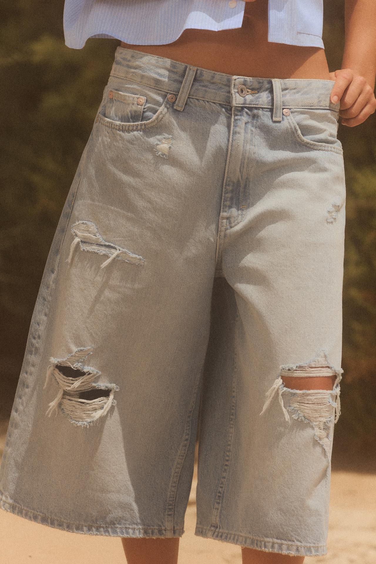 MID-RISE RIPPED DENIM BERMUDA JORTS
