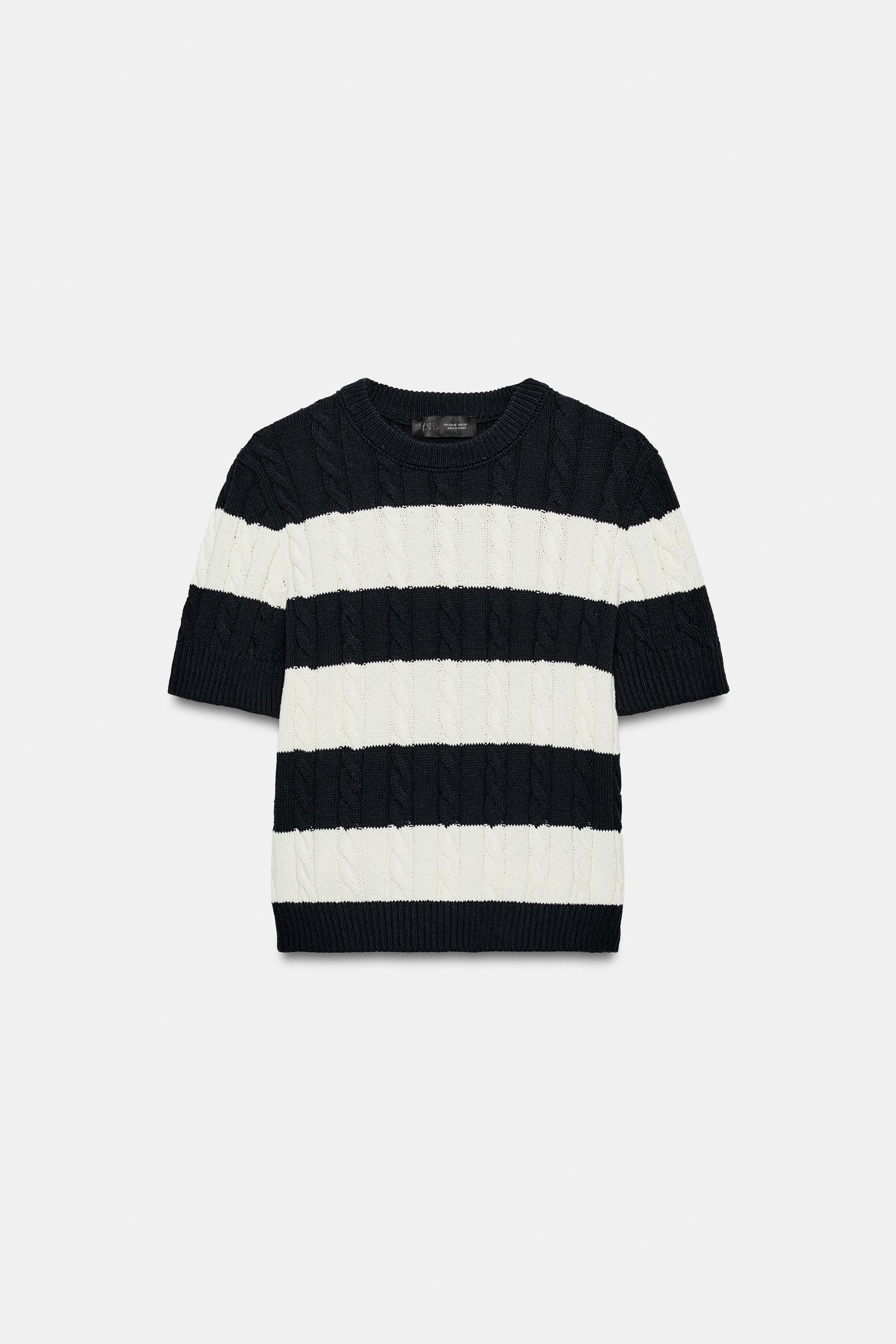 PULL EN MAILLE À RAYURES ET TORSADES