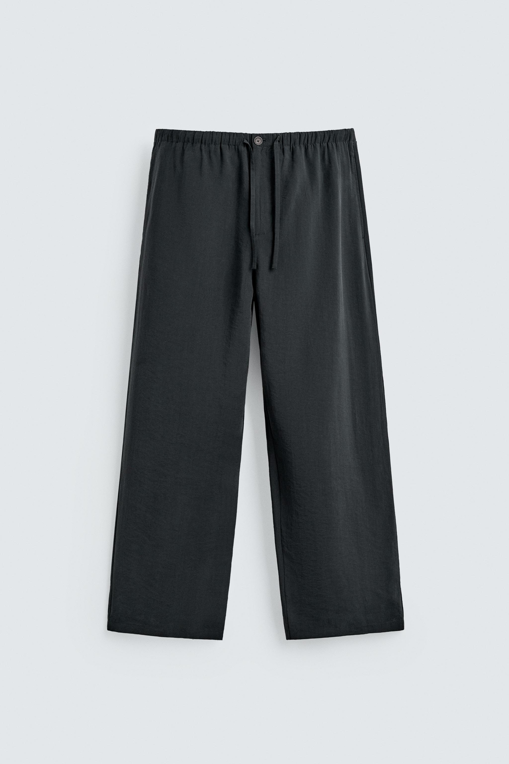 RELAXED FIT FLOWY PANTS