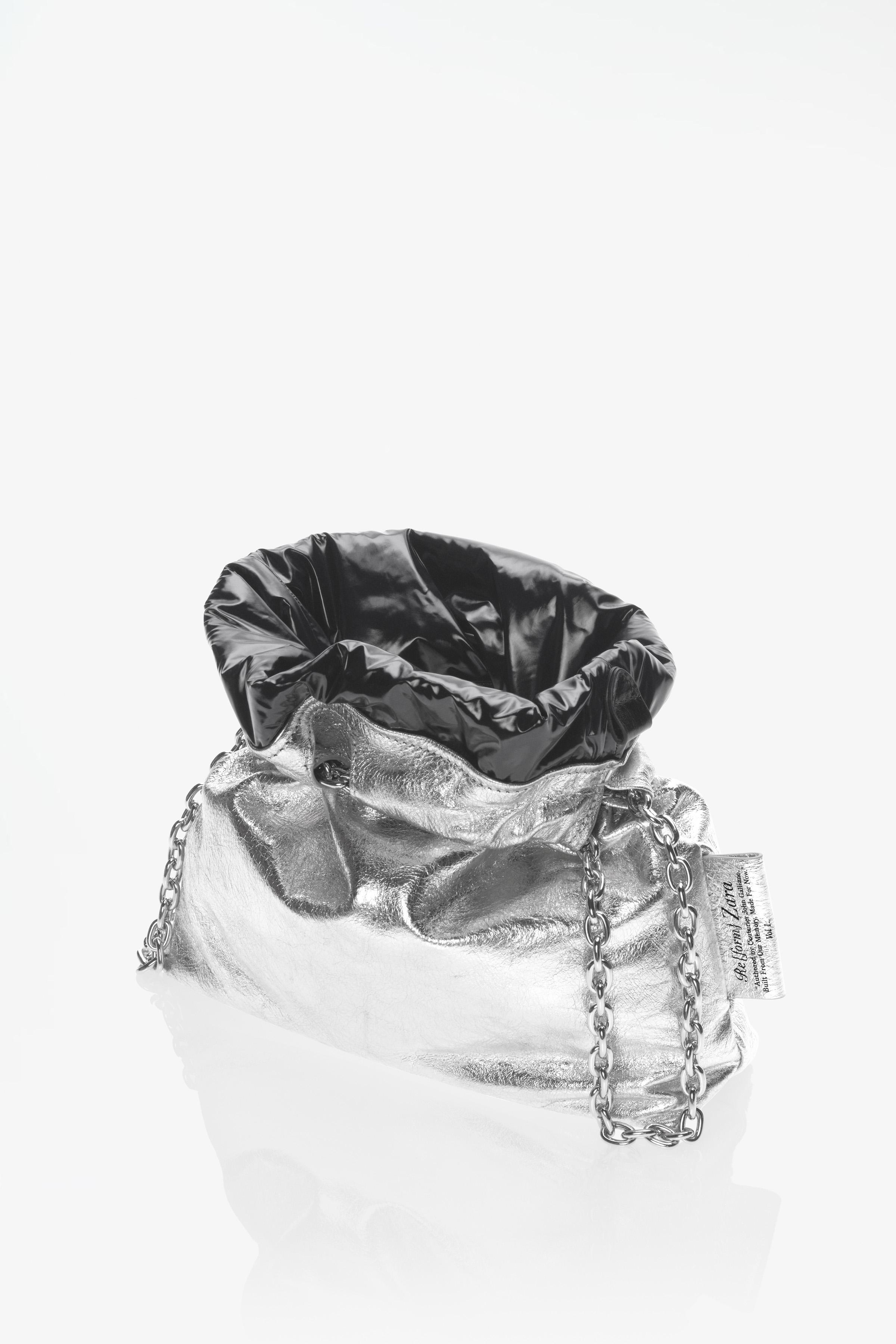 LIMITED EDITION TRI-CHIC SMALL LEATHER BAG