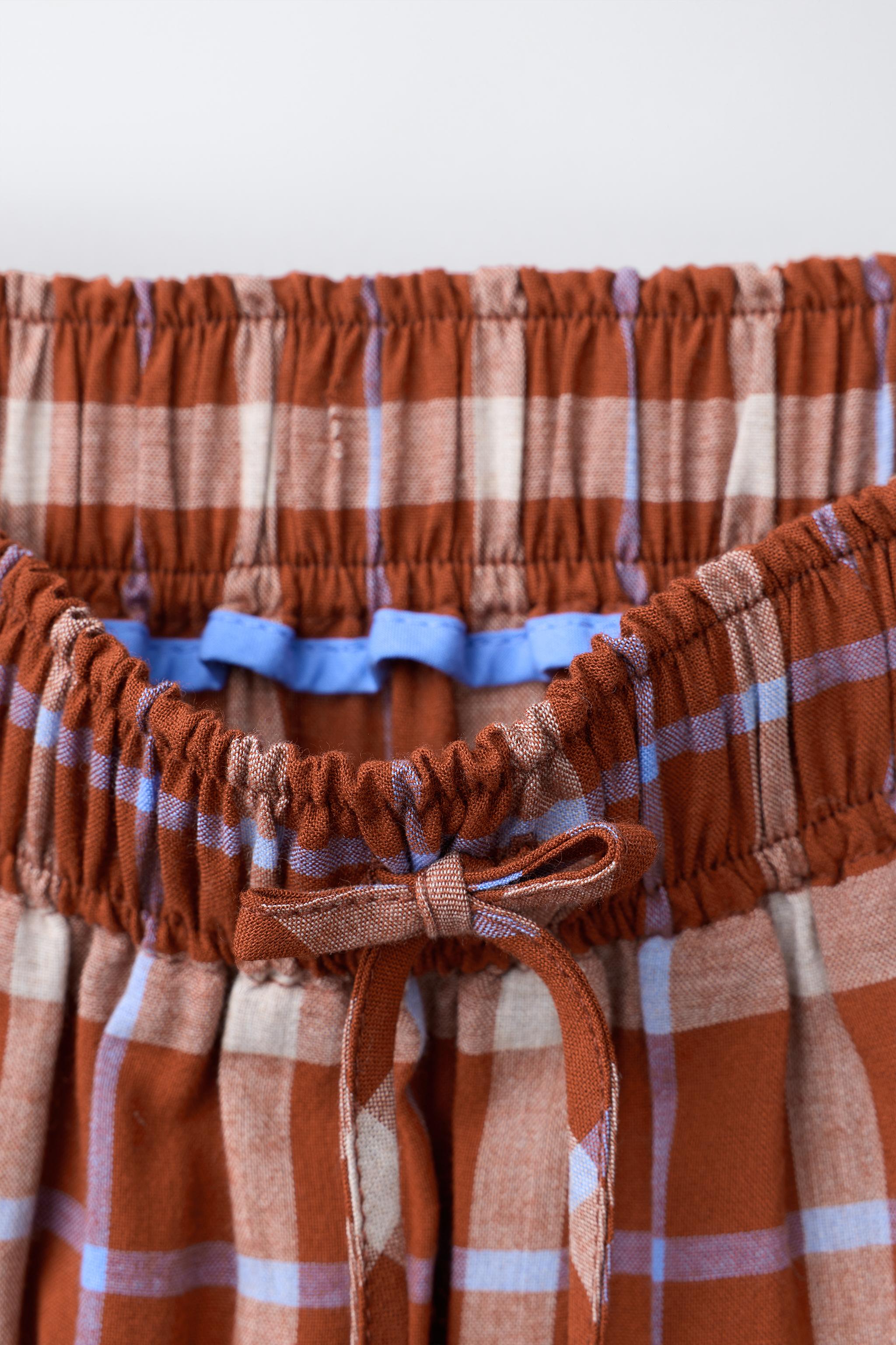 PLAID TIERED MIDI SKIRT