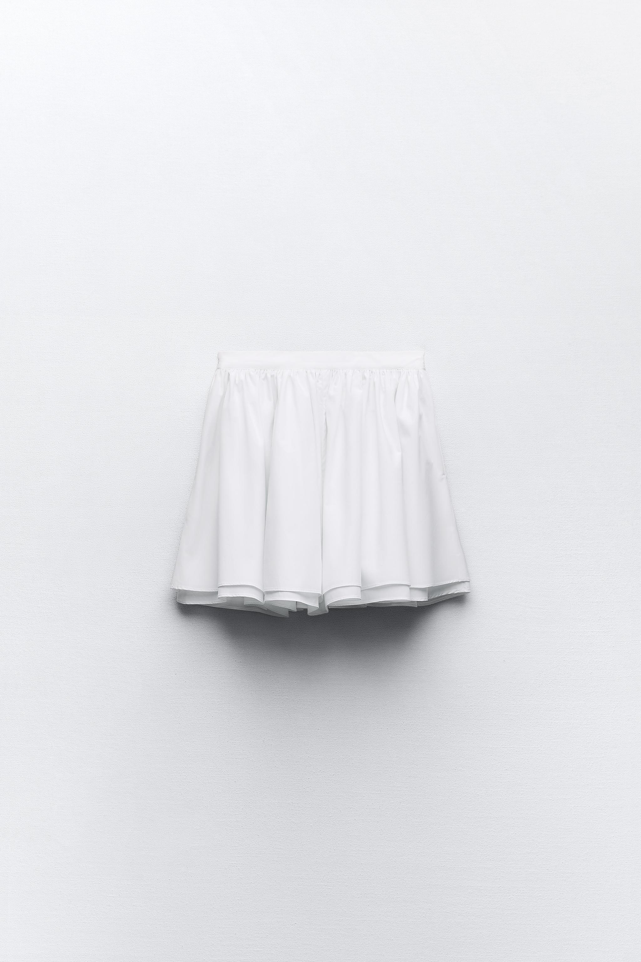 KHAITE Mini Skirt in White