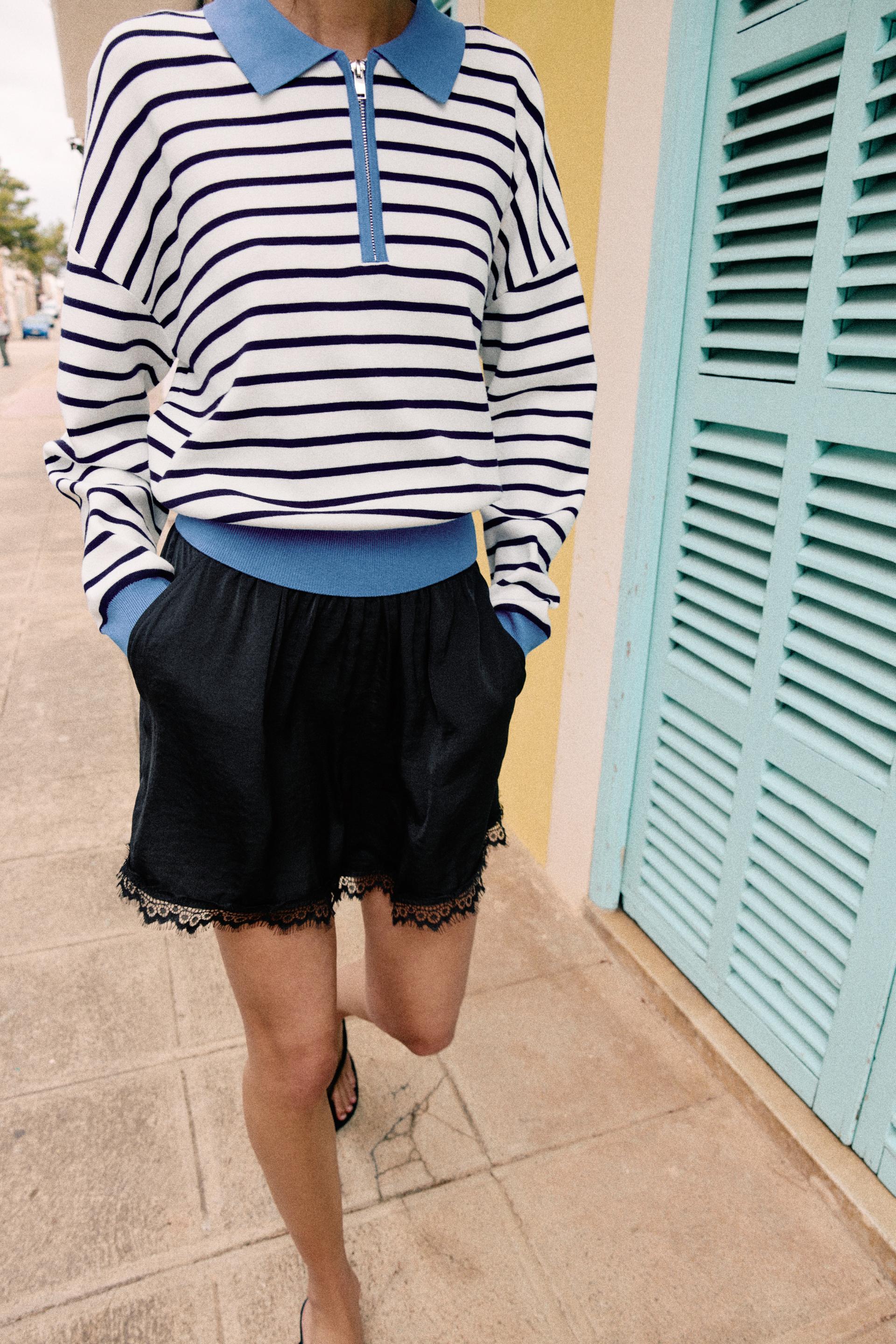 Short satinado de encaje