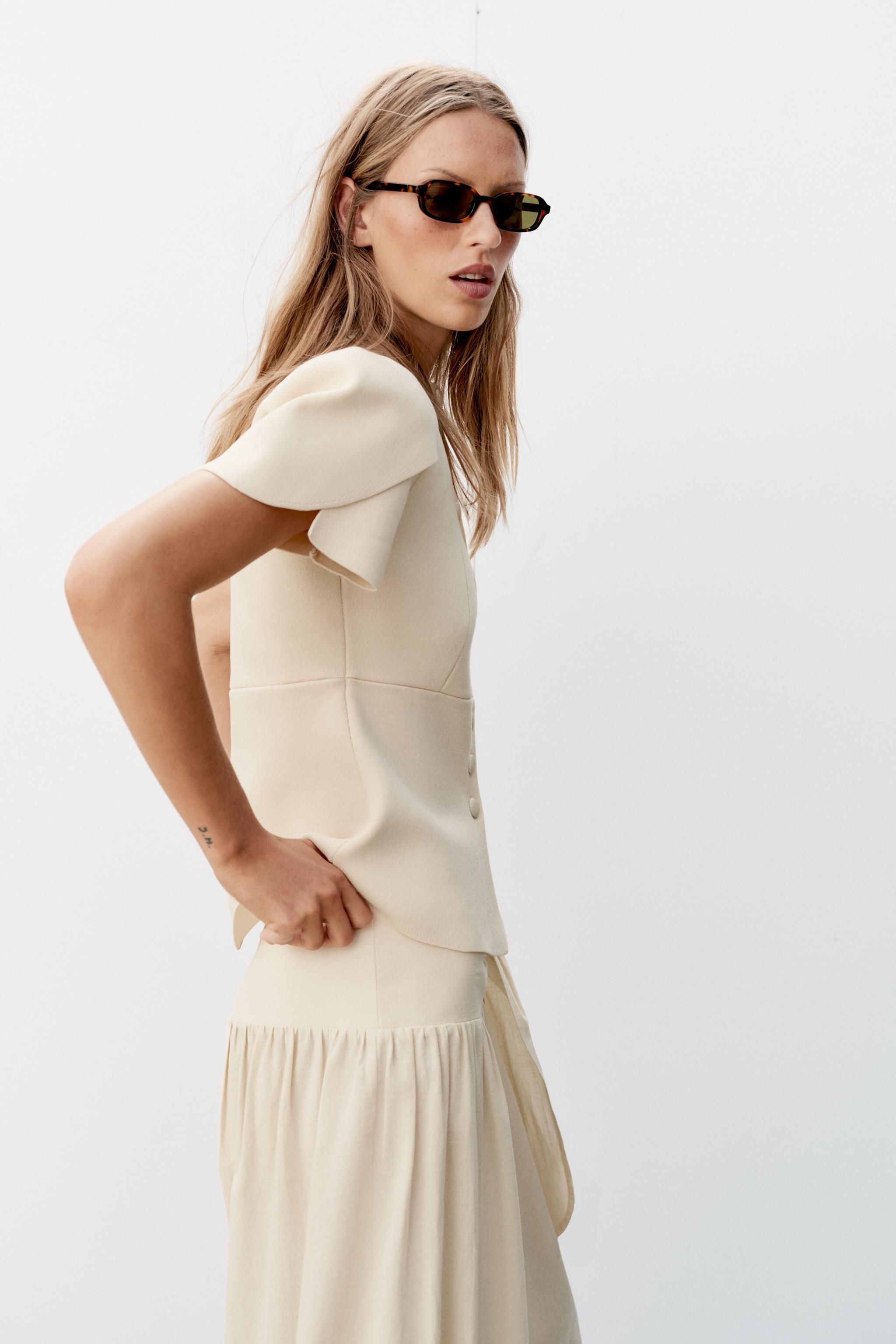 CARDIGAN WITH PUFF SLEEVES AND SLITS