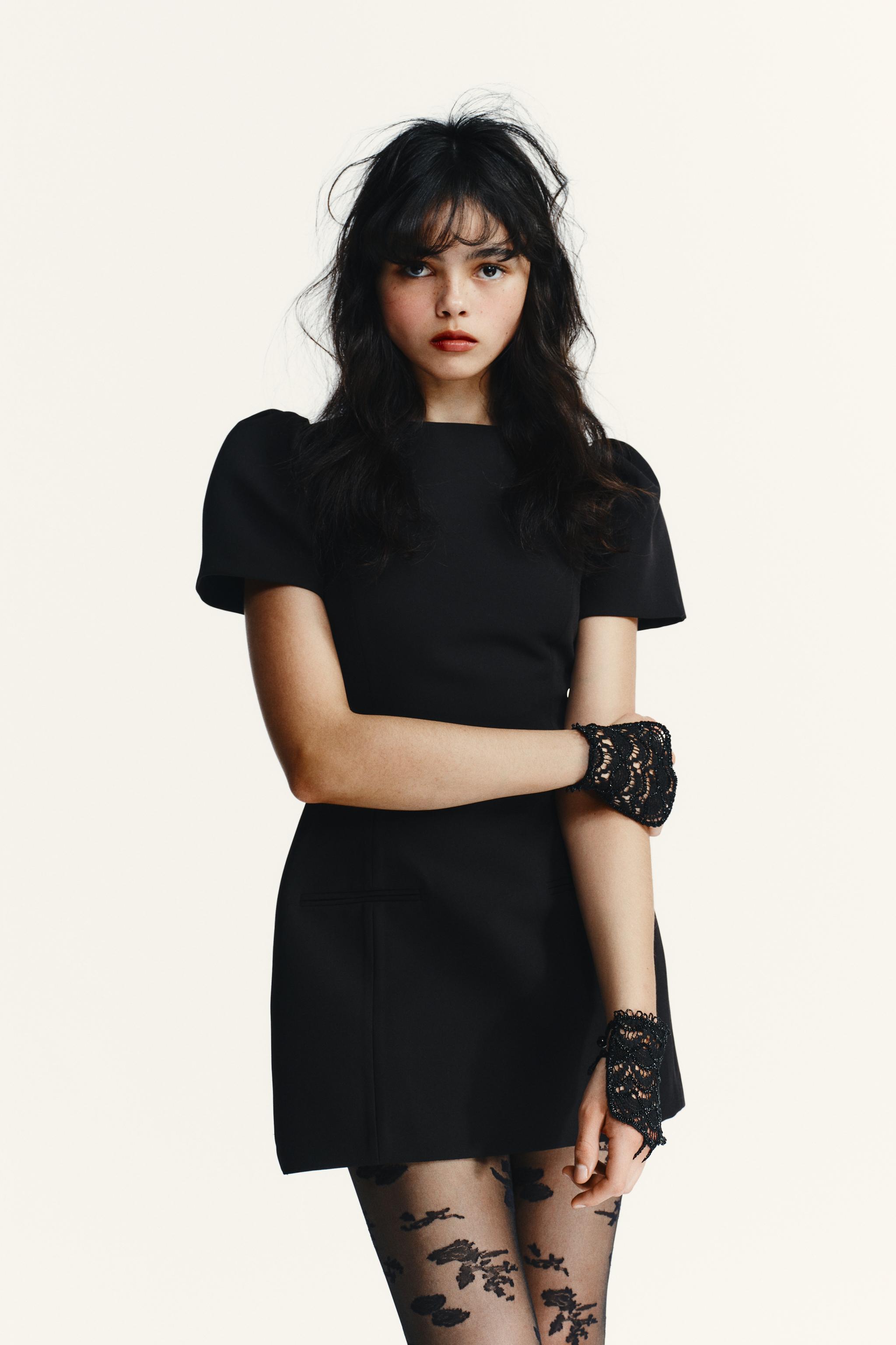 SHORT PLEATED POCKET DRESS