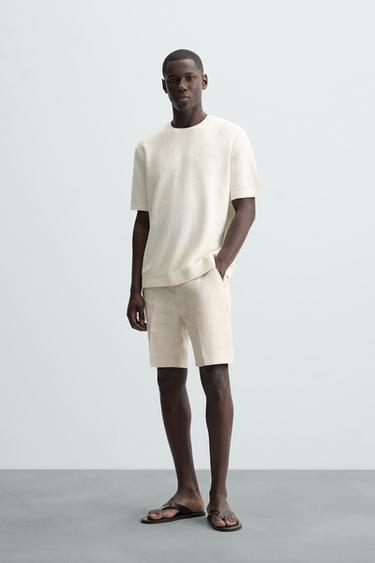 CAMISETA PUNTO JACQUARD ONDA - Blanco roto de Zara - Imagen 0