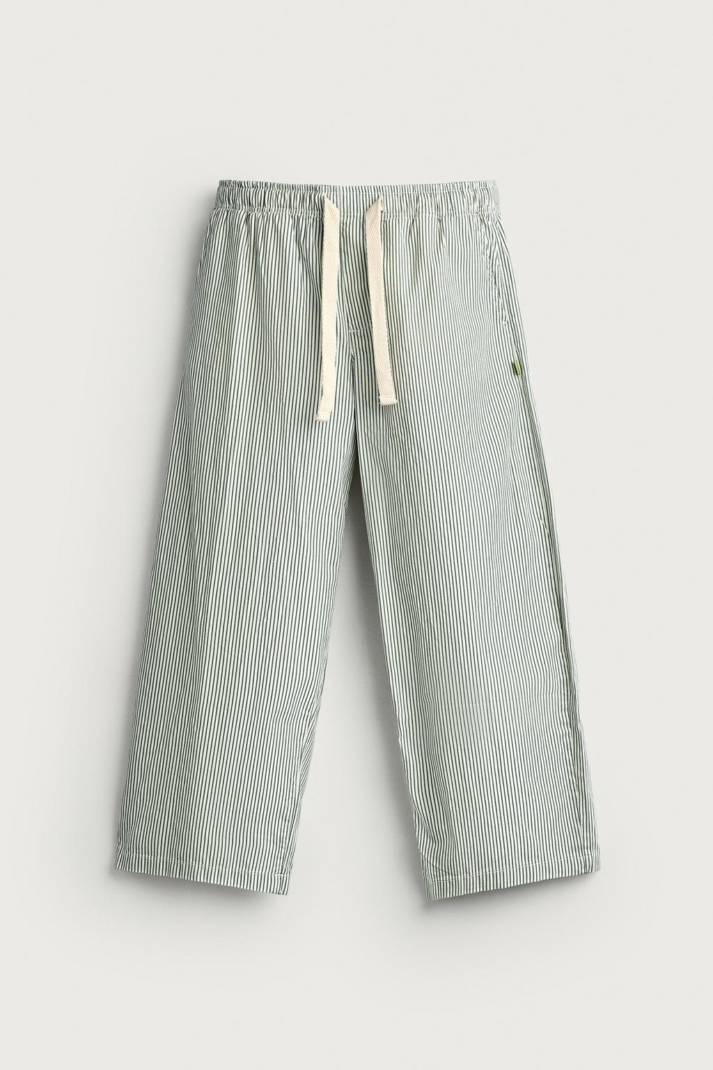 STRIPED BAGGY FIT TROUSERS