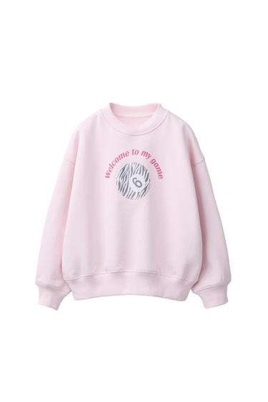 PULOVER S POTISKOM KROGLE ZA BILJARD Z ZEBRASTIM POTISKOM - Rožnata od Zare