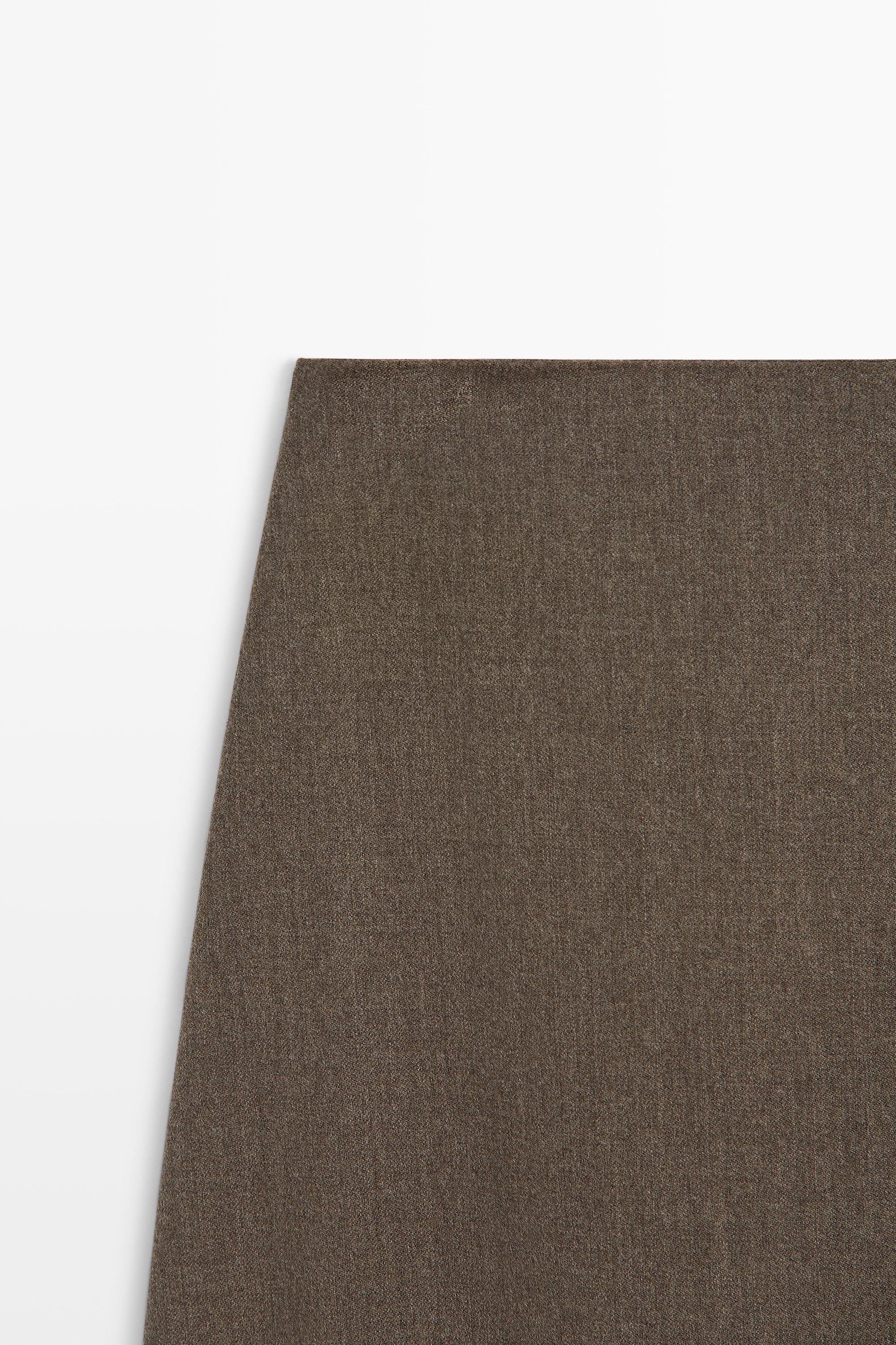 Jupe midi détail boucle