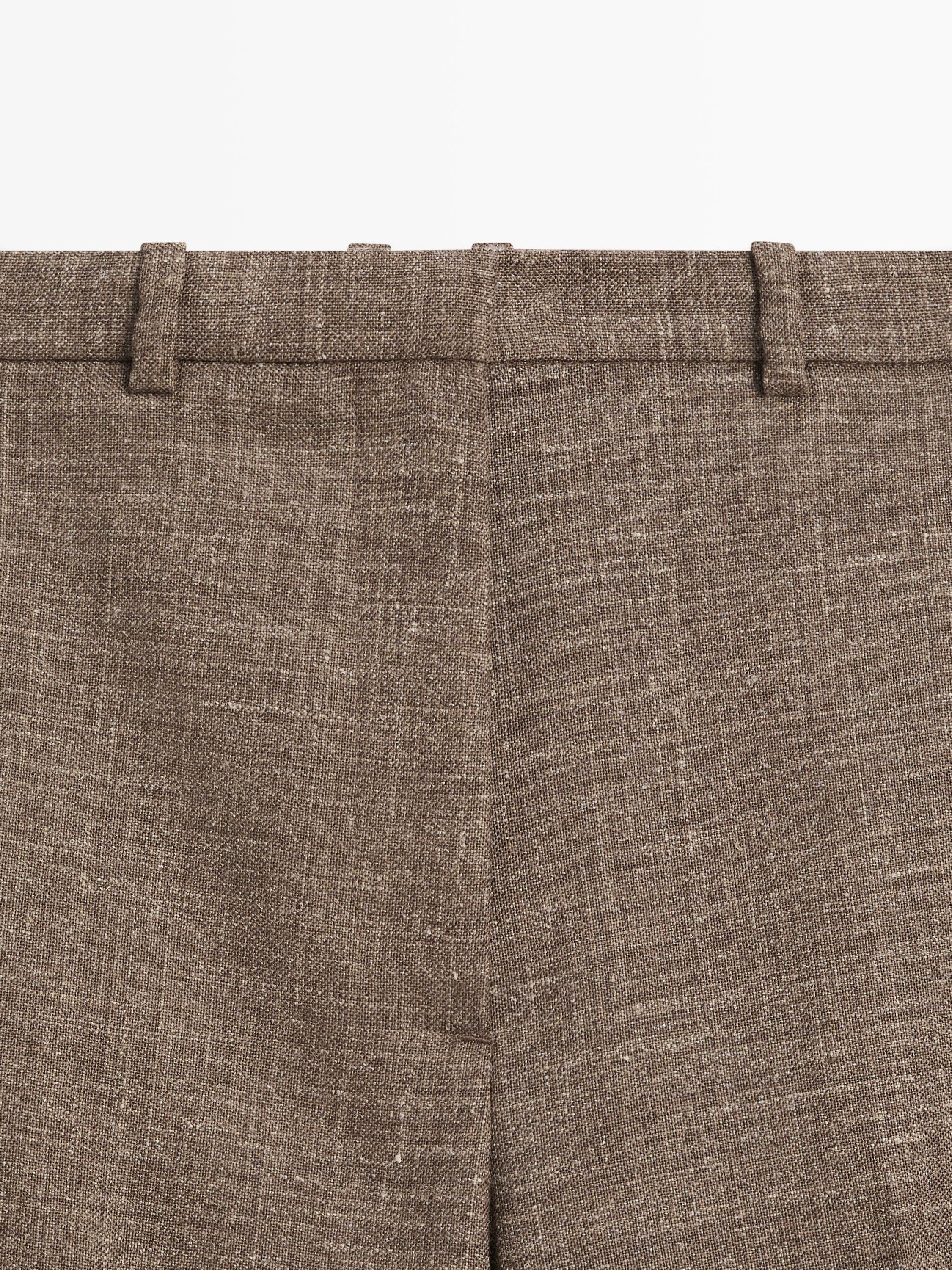 Wide-leg voluminous wool blend trousers