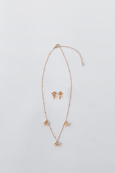 PACK COLLAR Y PENDITES CLIP FLORES - Dorado de Zara