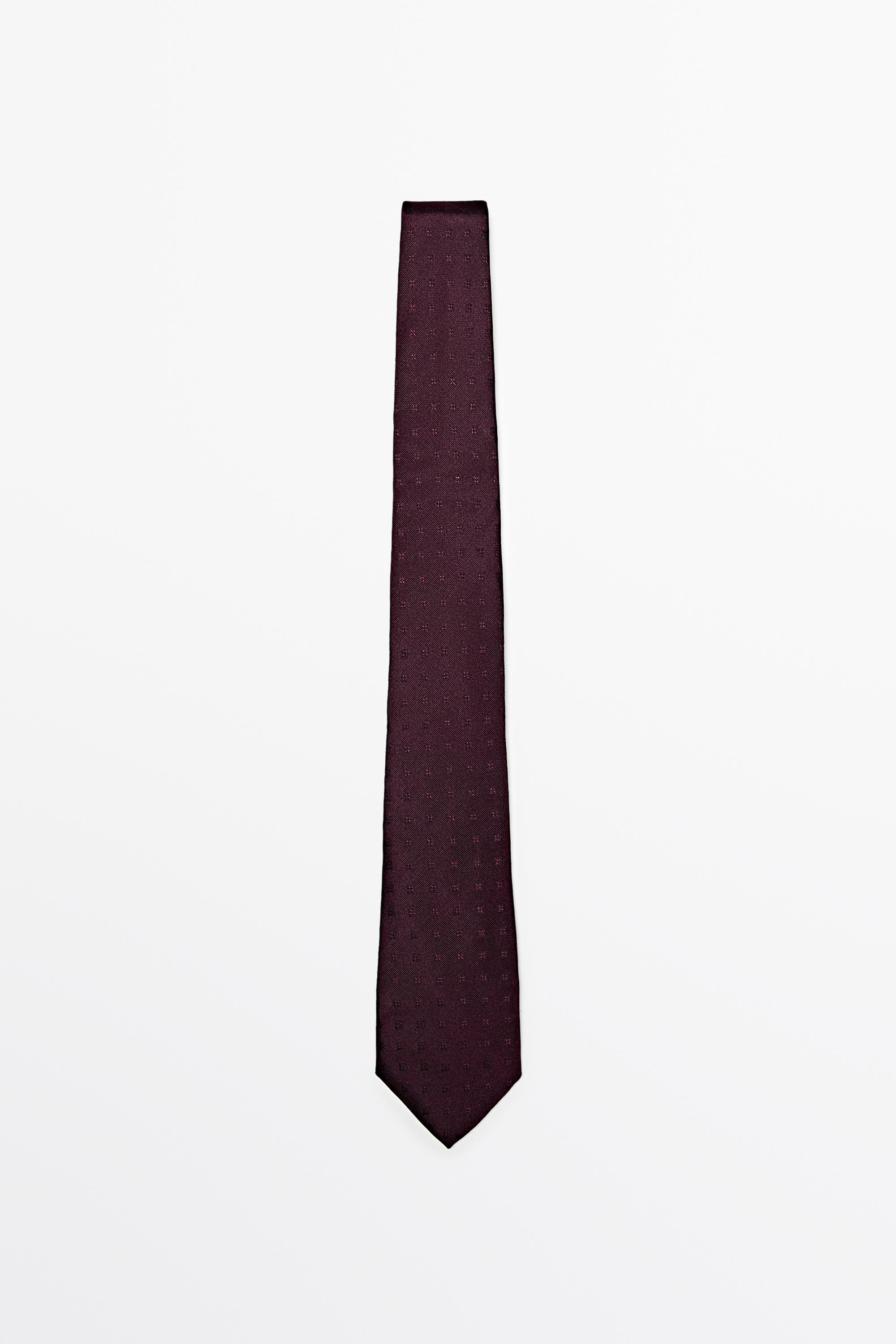 100% silk tie with embroidered detail