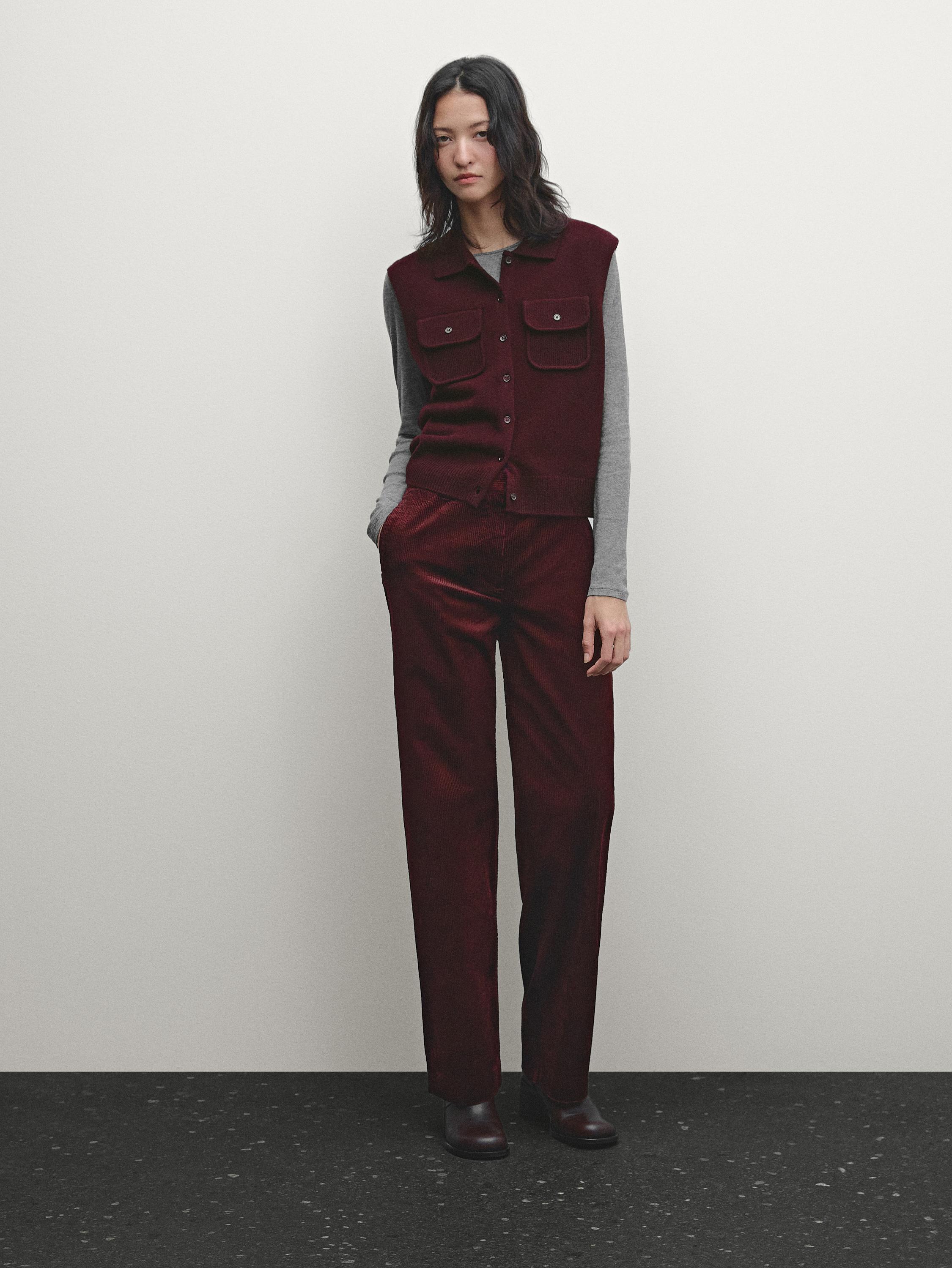 Veste en maille cropped sans manches avec poches