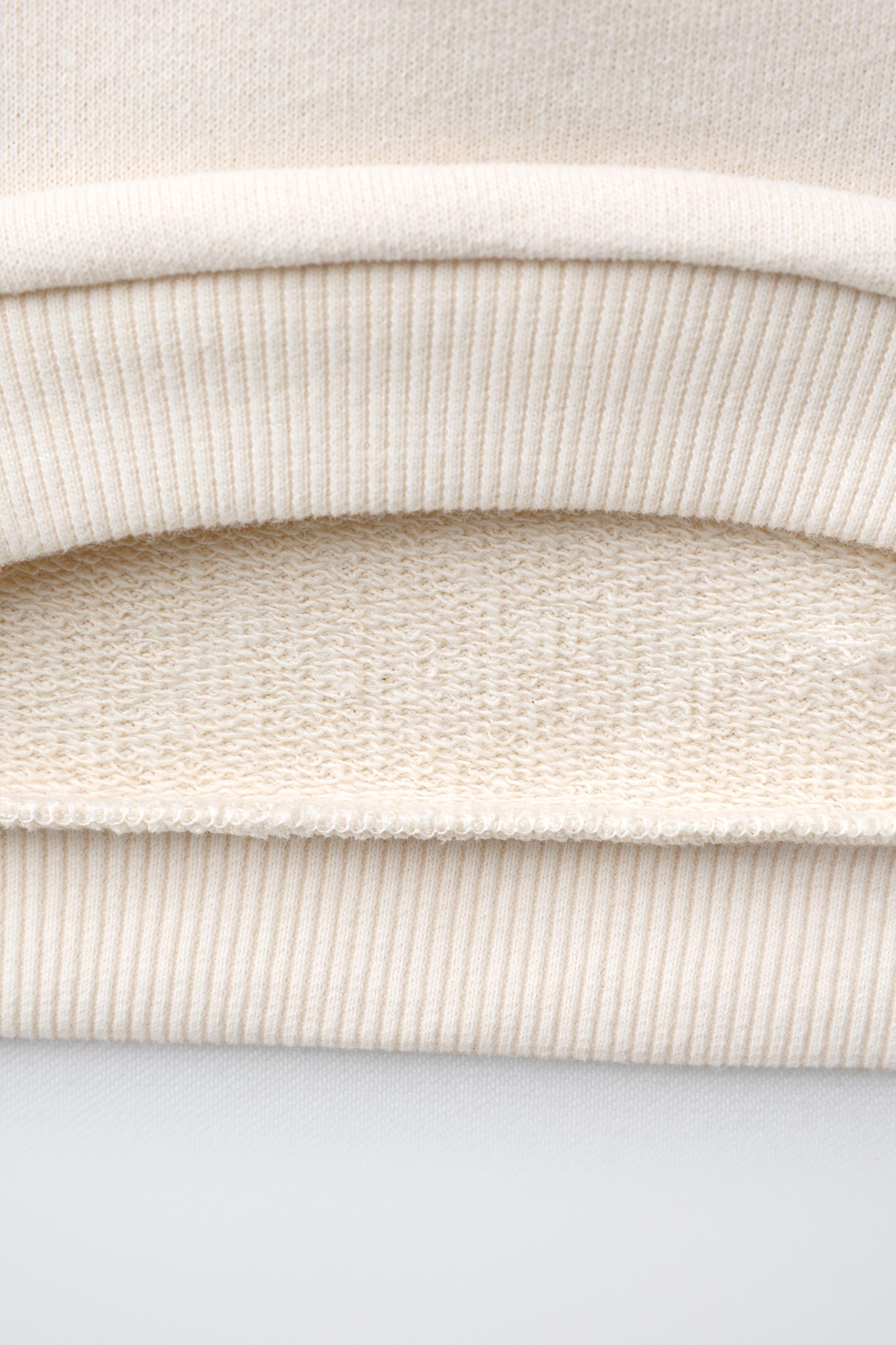 SWEAT À BRODERIES WINNIE L'OURSON © DISNEY