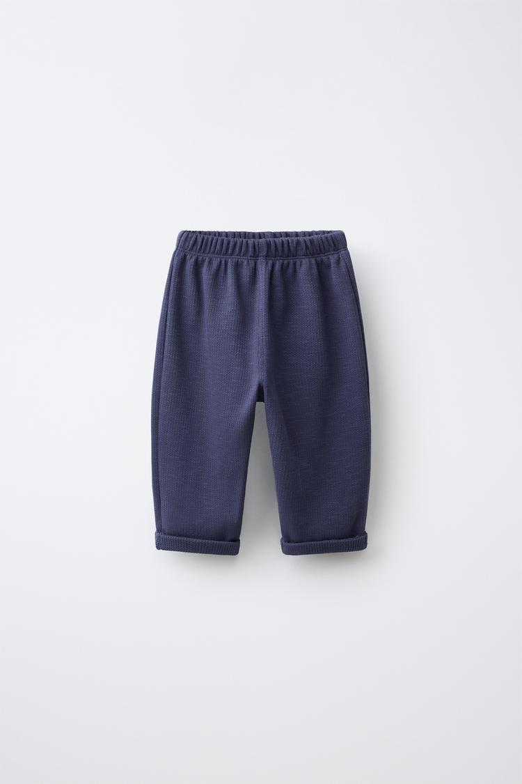 PANTALÓN BOLSILLO ETIQUETA