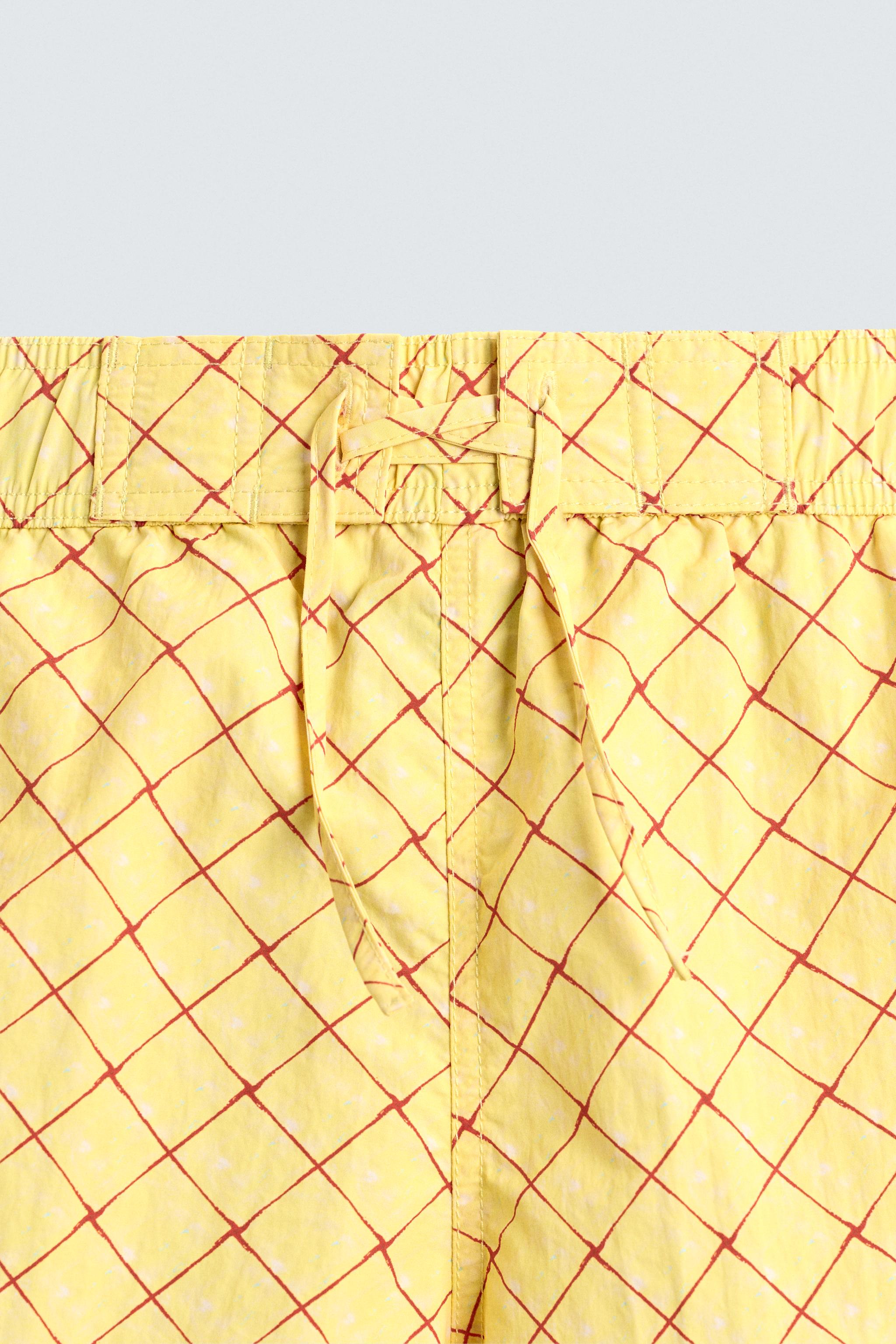 MAILLOT DE BAIN MI-LONG À IMPRIMÉ GÉOMÉTRIQUE DÉLAVÉ