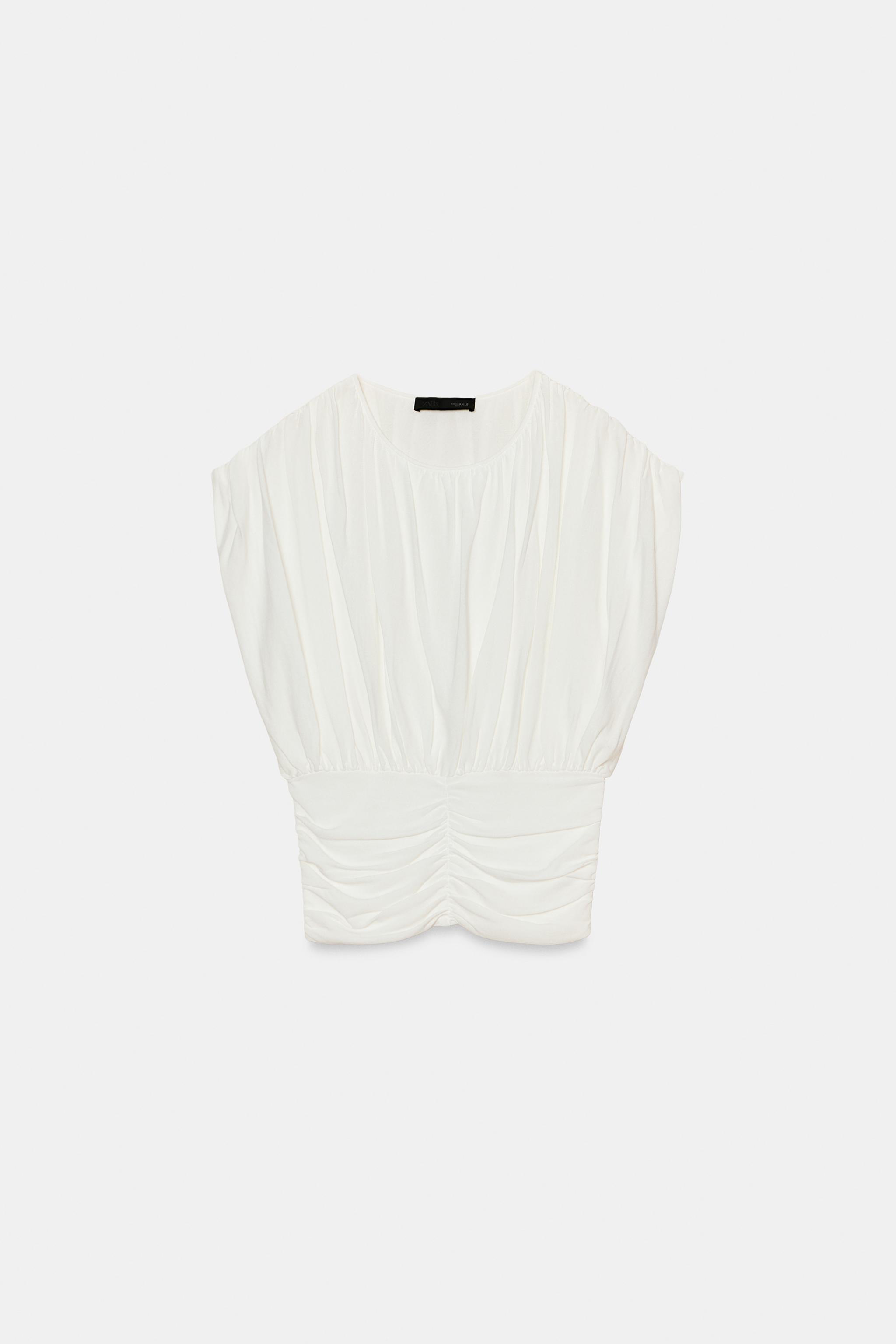 TOP DRAPÉ EN MAILLE