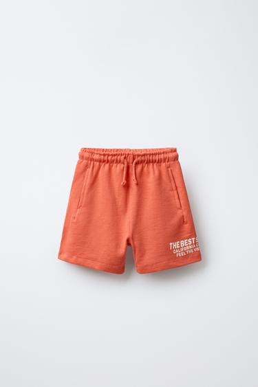 BERMUDA STRAIGHT FELPA TEXTO - Rojo claro de Zara