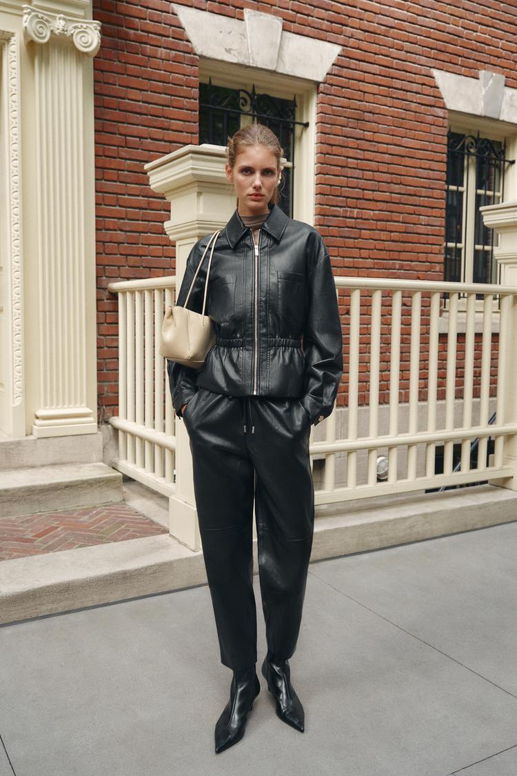 LEATHER EFFECT TROUSERS WITH ELASTICATED WAIST