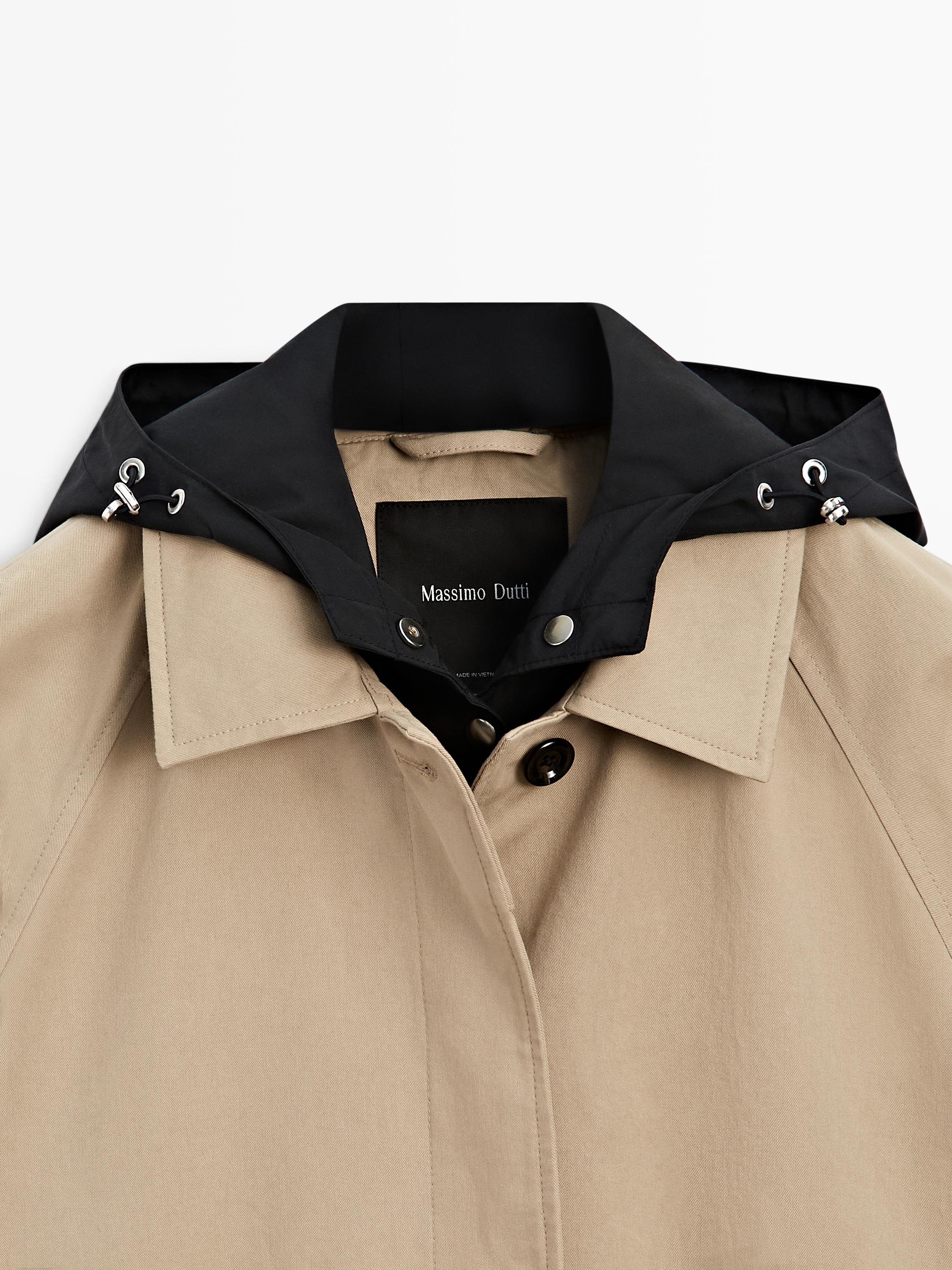 Cape trench coat with detachable hood