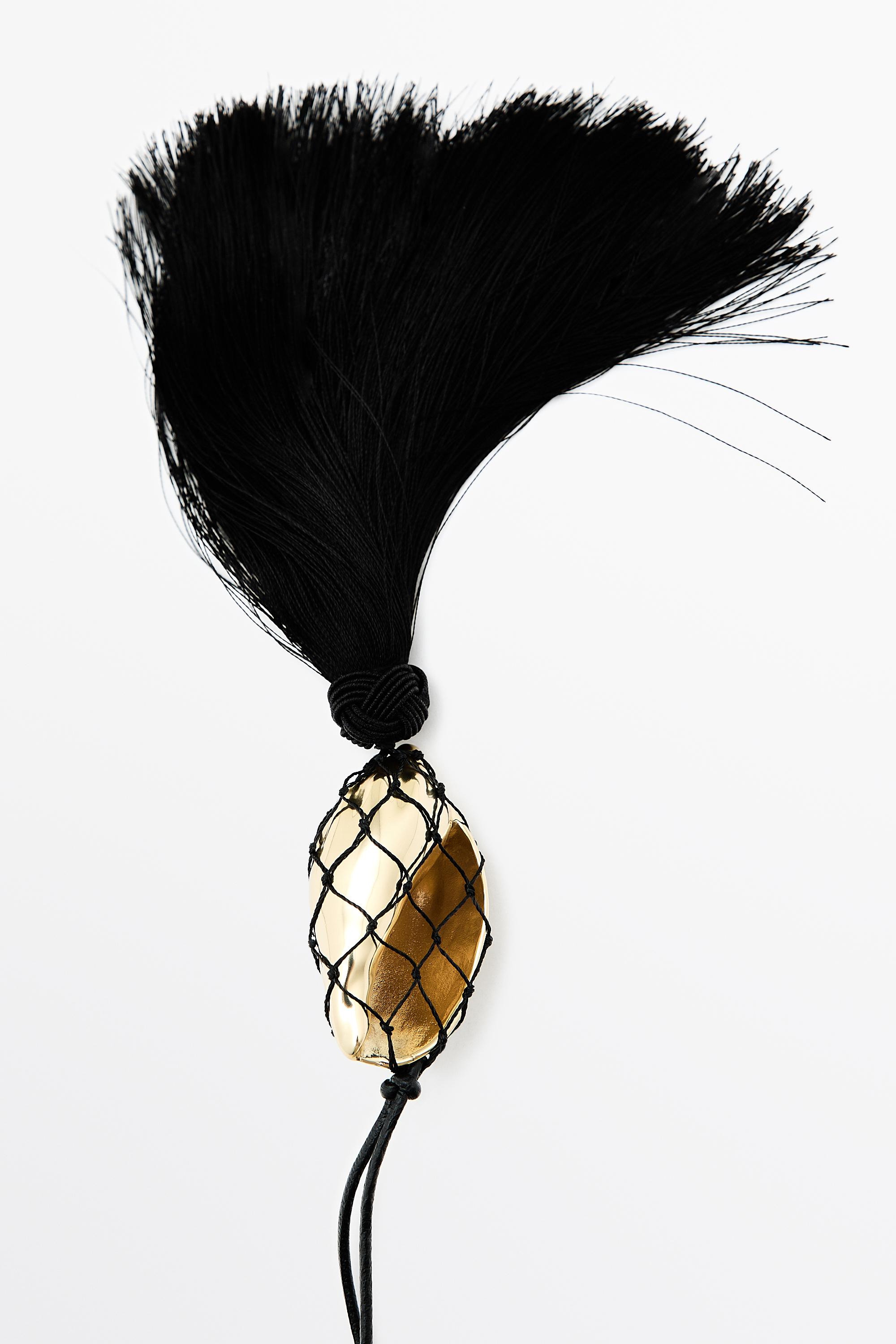 Long leather cord necklace with shell and tassel