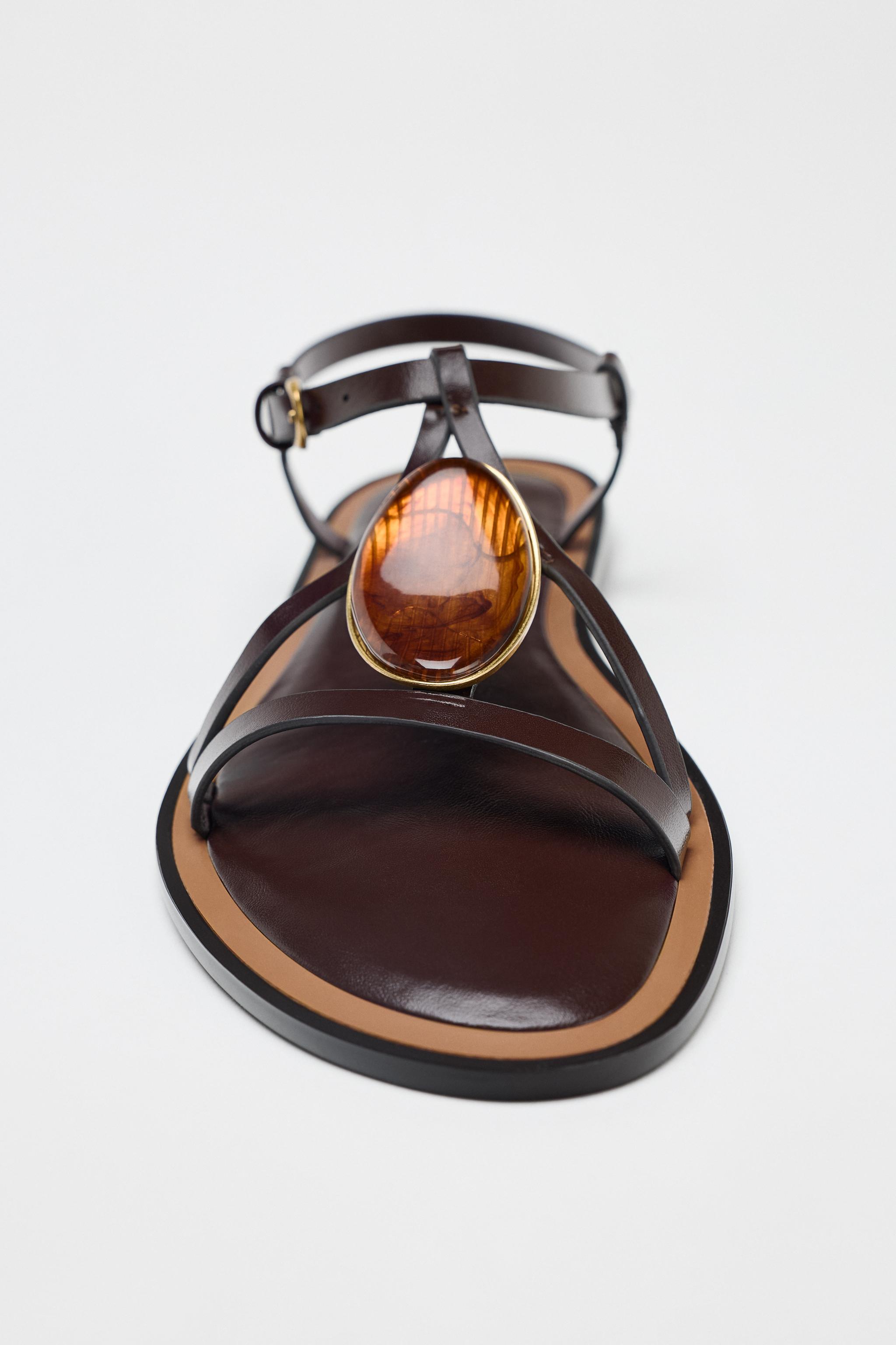 SANDALS WITH METALLIC APPLIQUÉ
