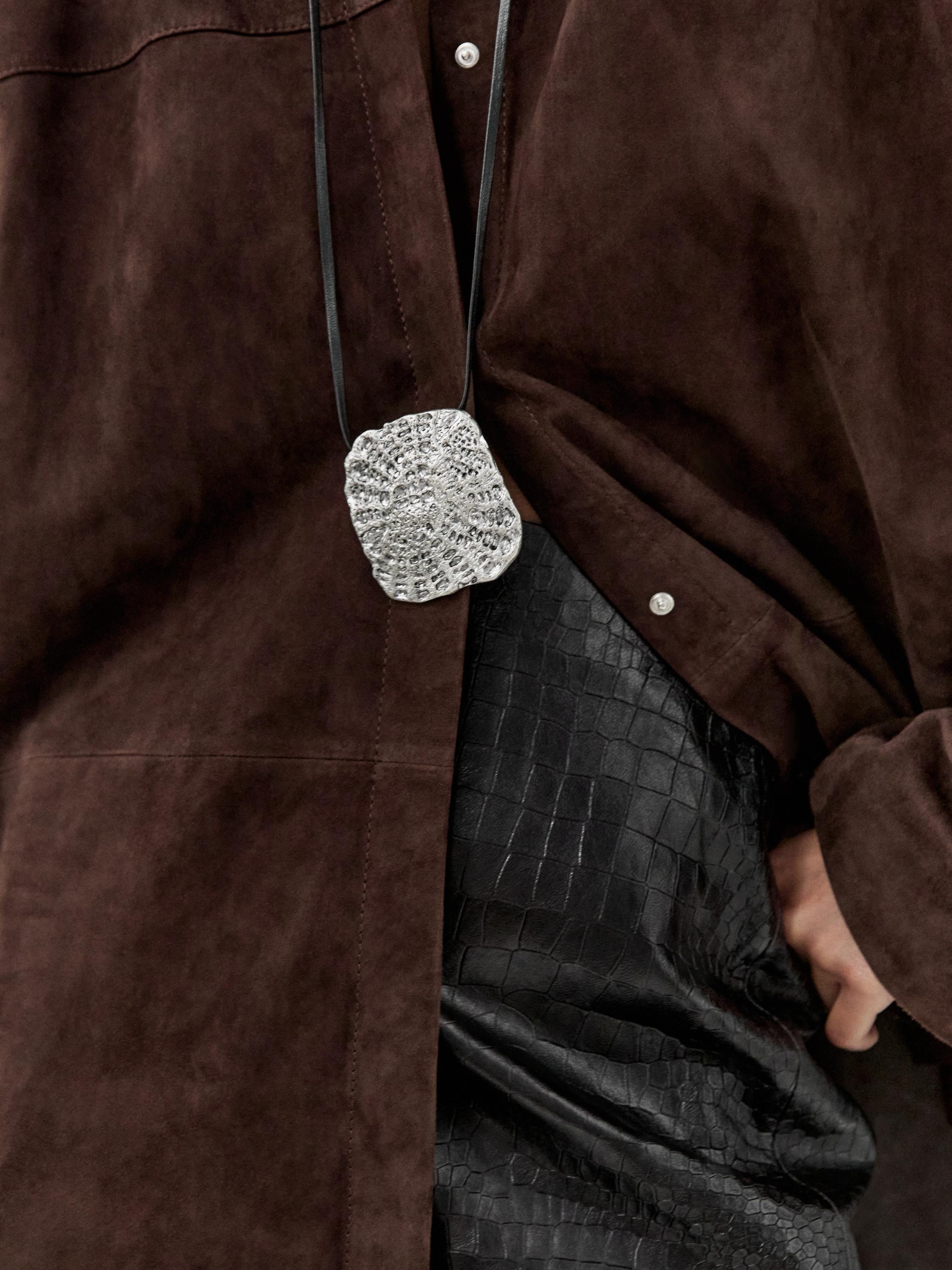 Textured medallion necklace