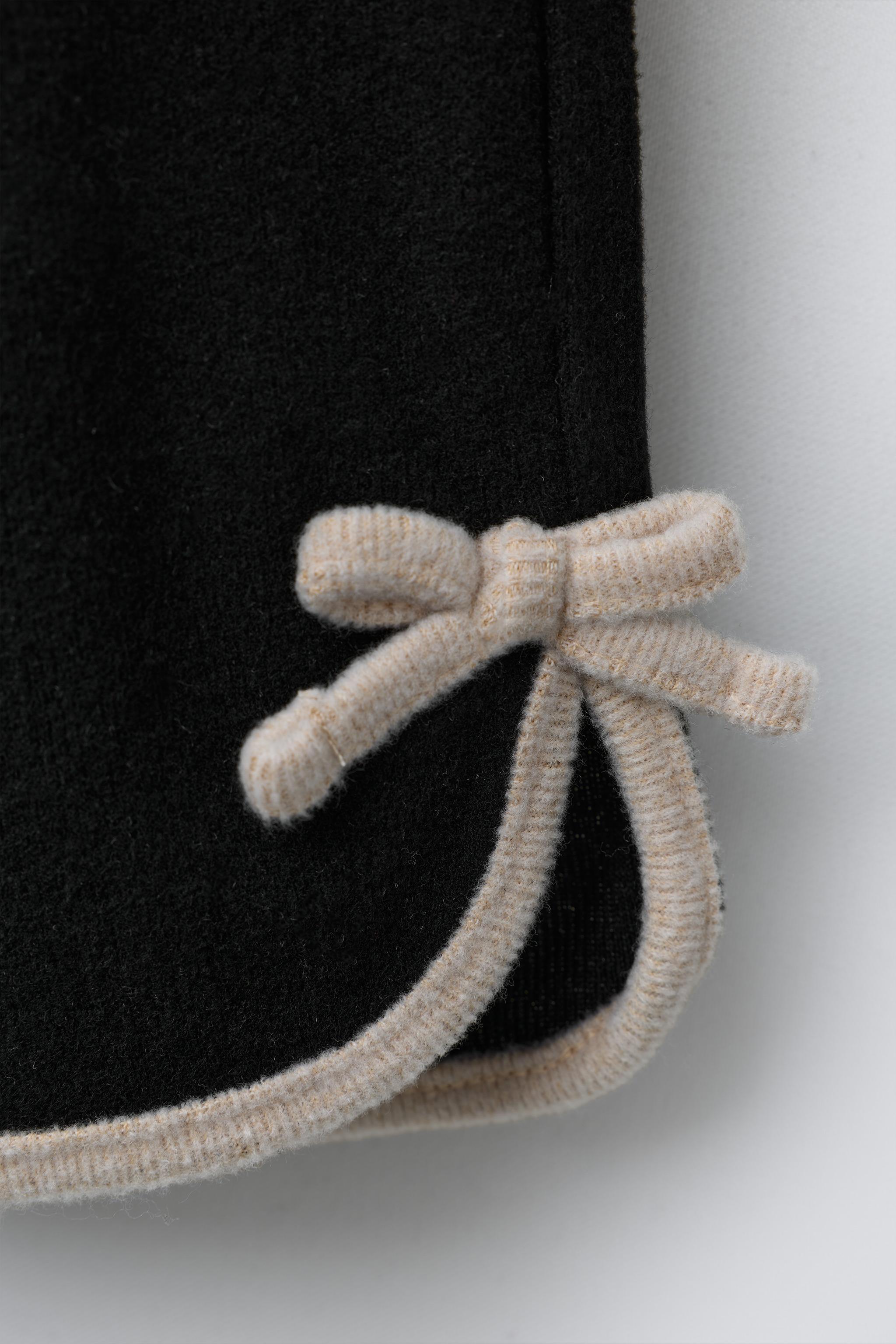 PANTALON JUPE-CULOTTE SOFT TOUCH AVEC DÉCOR NOEUD EN CONTRASTE