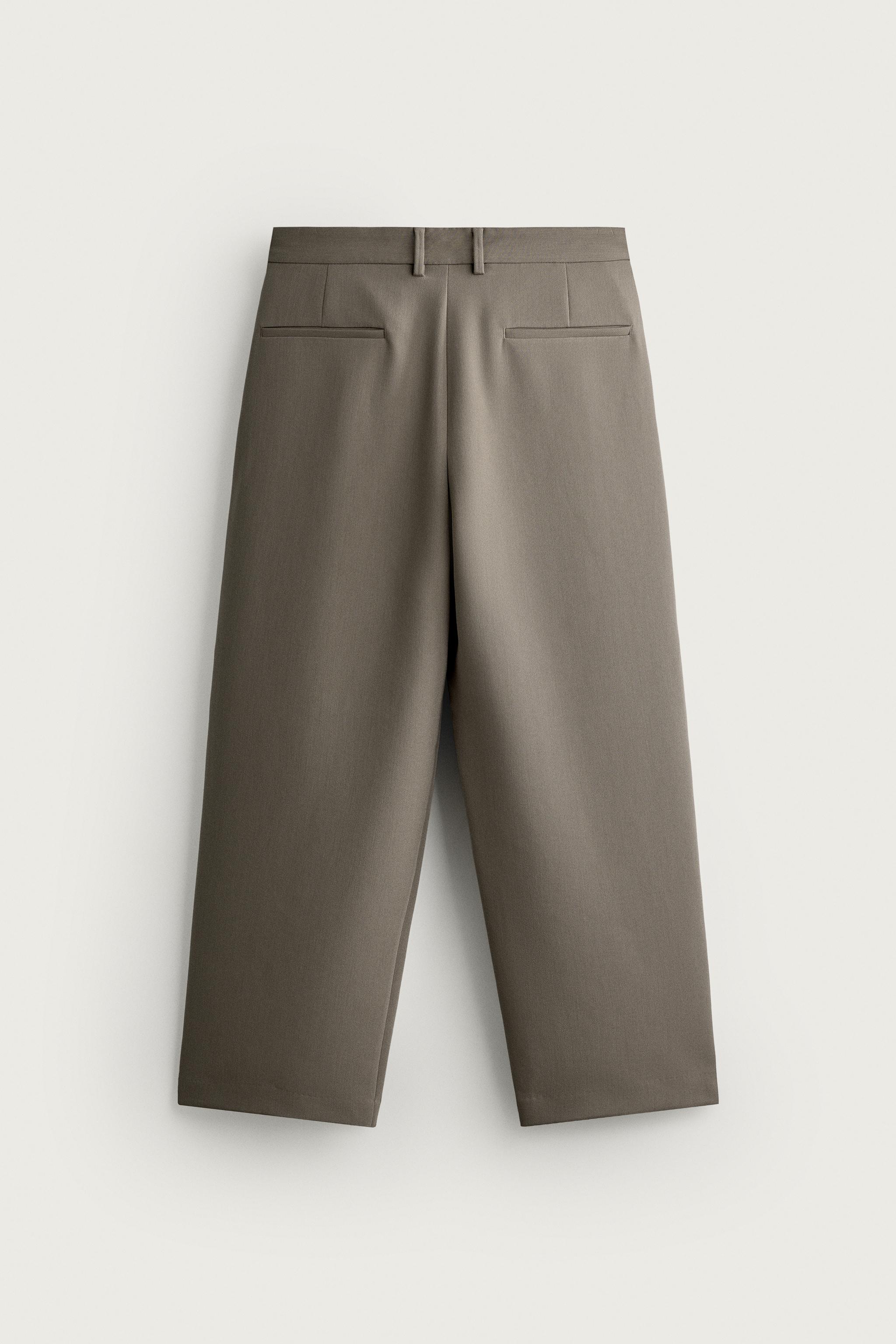 RELAXED FIT PLEATED PANTS