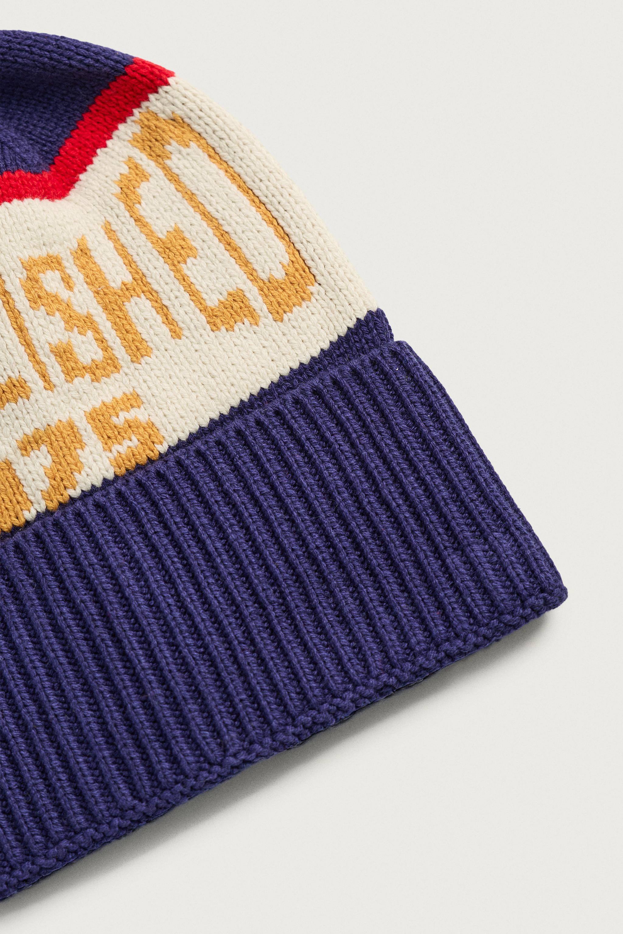 POM-POM JACQUARD KNIT BEANIE