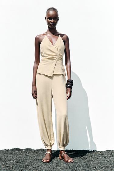 HALTER TWO-PIECE EFFECT JUMPSUIT - Sand by Zara - Image 0