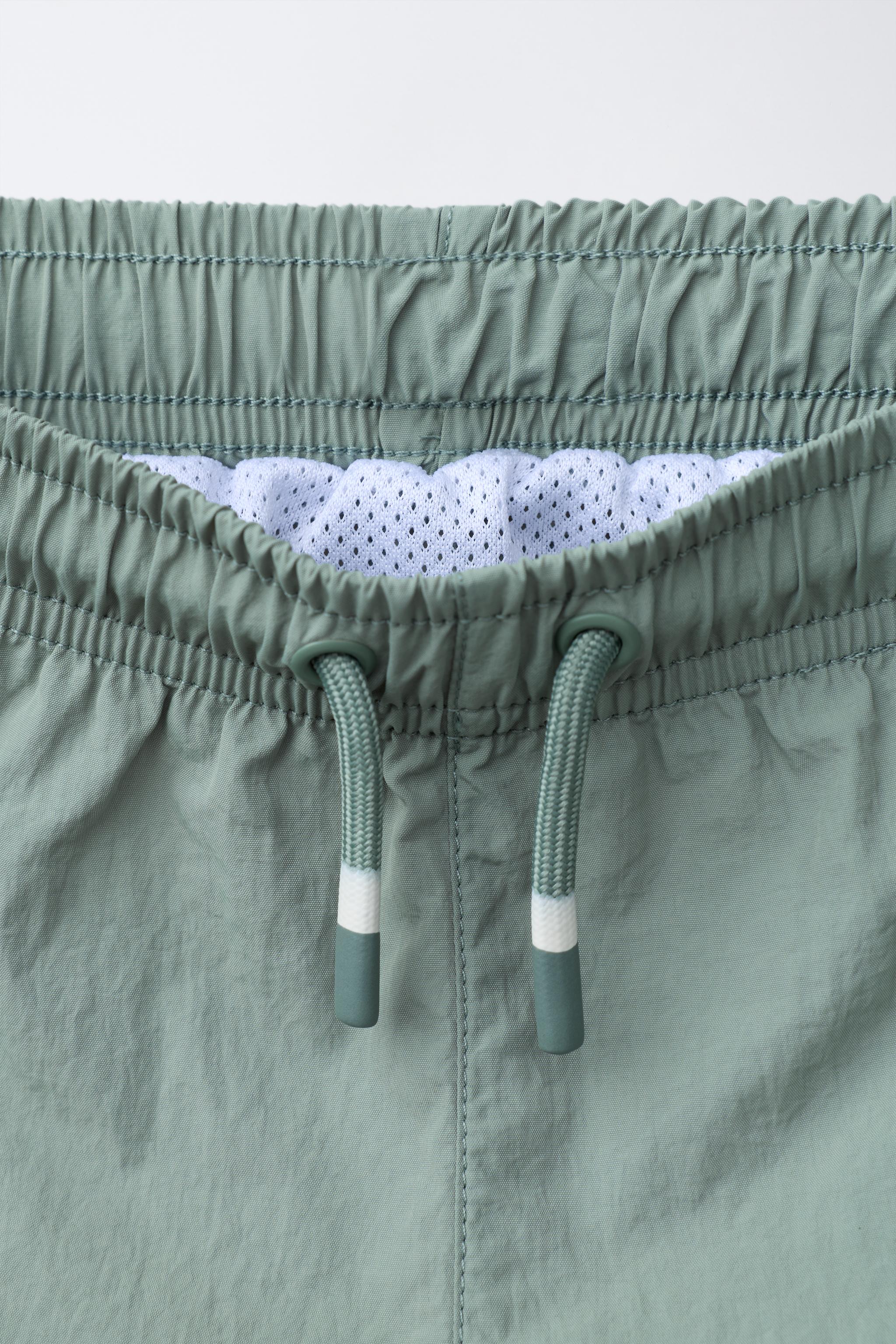 2-6 ANS/ SHORT DE BAIN À BANDES CONTRASTE