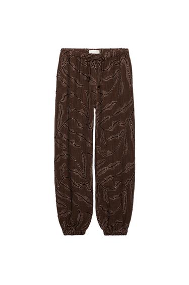 PANTALÓN BOMBACHO ABELORIOS BRILLANTES FÍO METALIZADO - Marrón de Zara