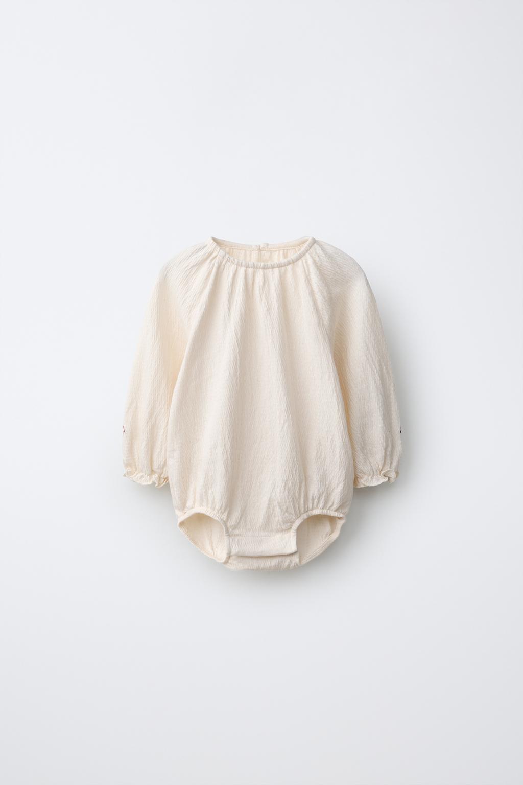 TEXTURED EMBROIDERED FLOWER BODYSUIT