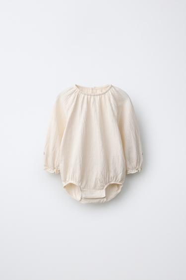 TEXTURED EMBROIDERED FLOWER BODYSUIT — Ecru 1