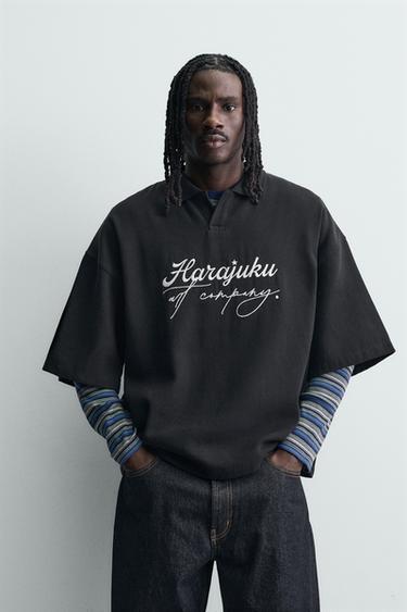 POLO ESTRUCTURA TEXTO BORDADO - Negro de Zara