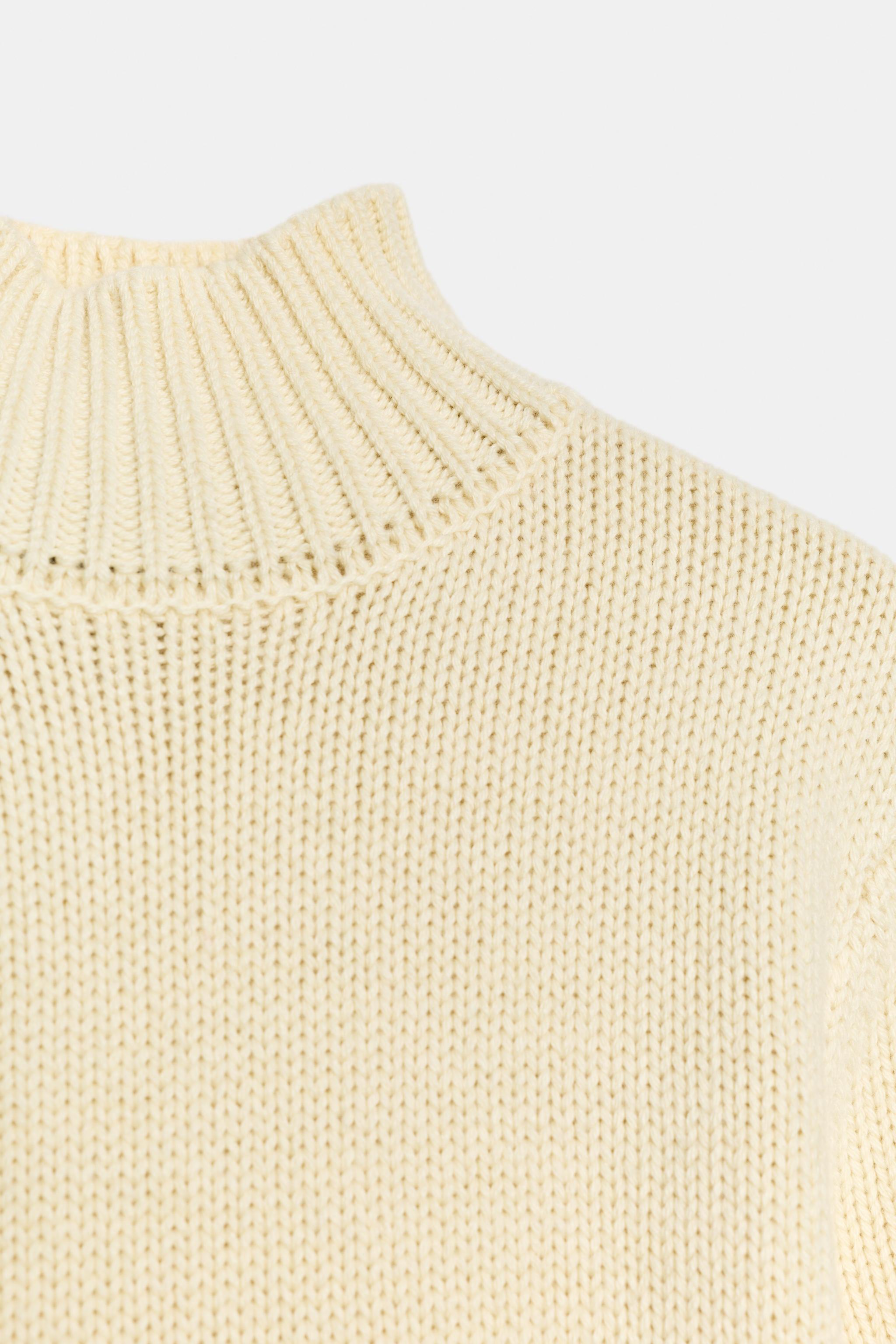 SHORT SLEEVE KNIT SWEATER