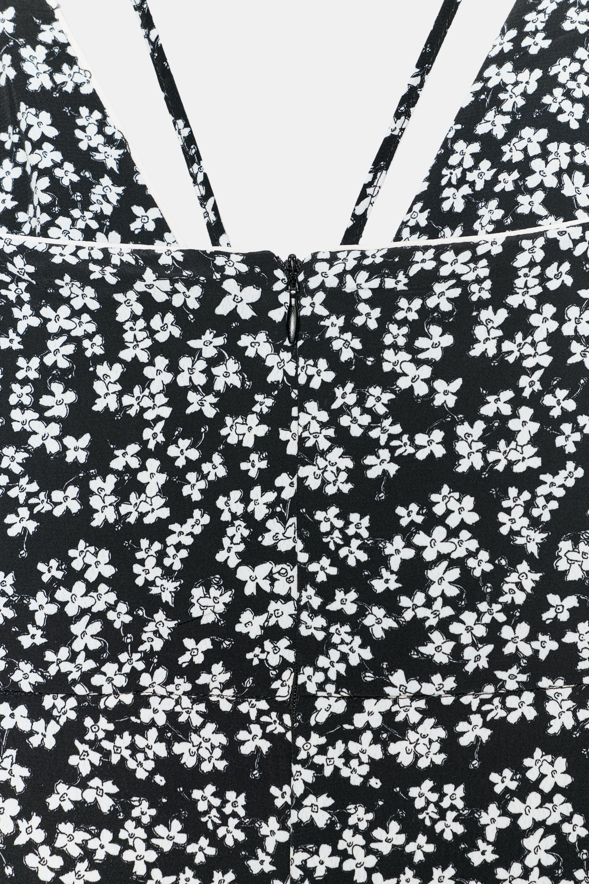 FLORAL PRINT STRAPPY JUMPSUIT