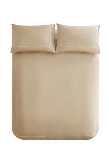 غلاف لحاف ساتين بشريط على الحافة - ذهبي الخاص بـ Zara