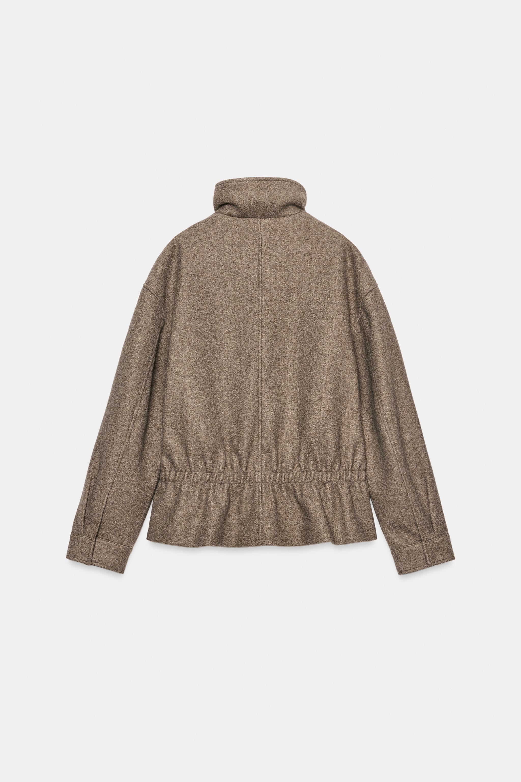 VESTE SOFT COL MONTANT PLIS
